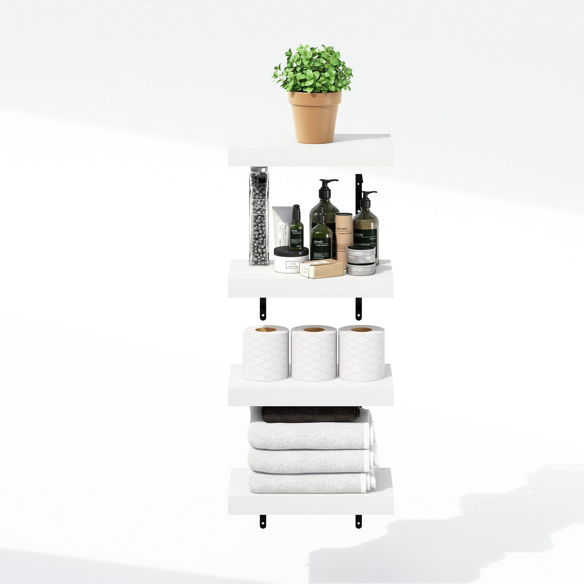 The text in the image is not clearly visible, but based on the context, it appears to be related to a bathroom shelf setup. Here is a possible interpretation and correction:

---

**Top Shelf:**
- Potted plant

**Middle Shelf:**
- Various toiletries (bottles, jars, etc.)

**Bottom Shelf:**
- Toilet paper rolls
- Towels

---

If you have specific text that needs correction or grouping, please provide it, and I can help further!