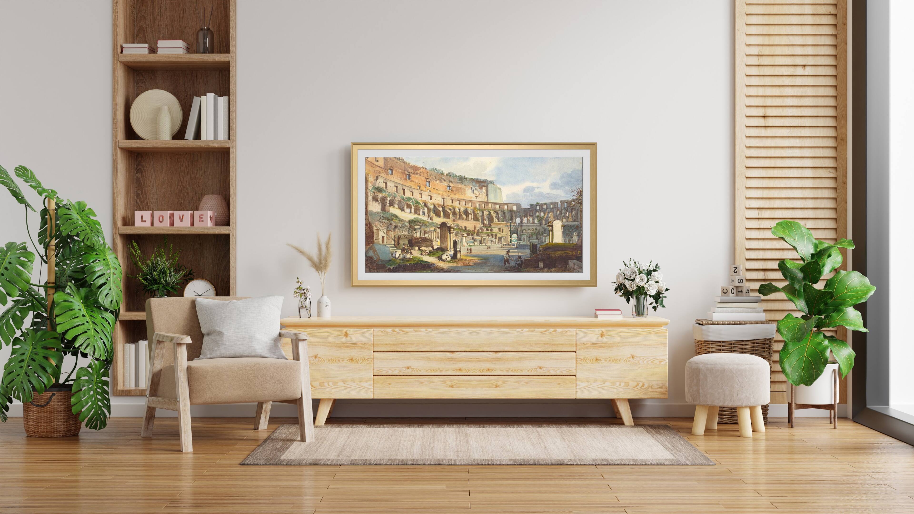 Angle. Deco TV Frames - Alloy Scoop Bezel for Samsung The Frame and Frame Pro TV - 65" - Pale Gold.