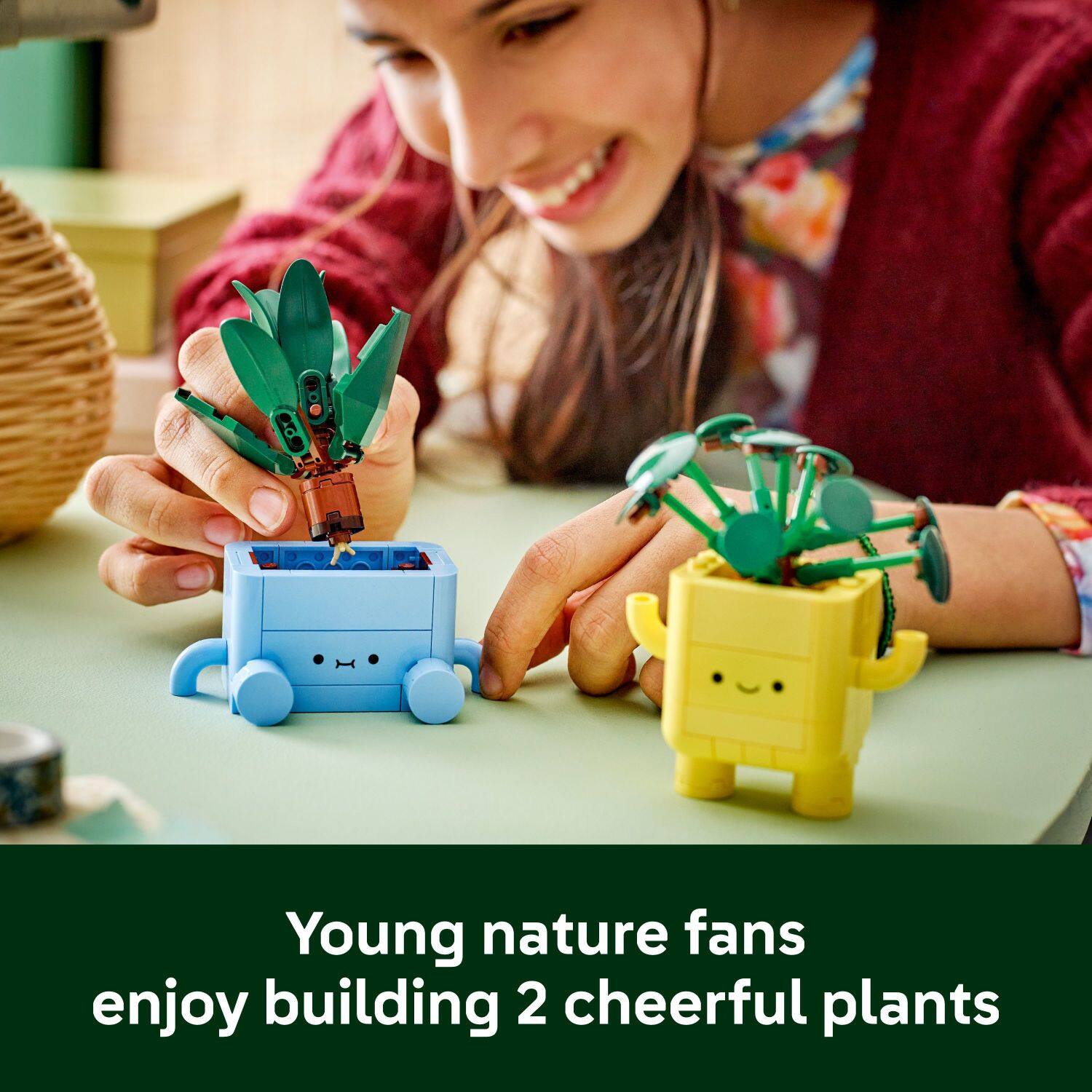 Young nature fans enjoy building 2 cheerful plants