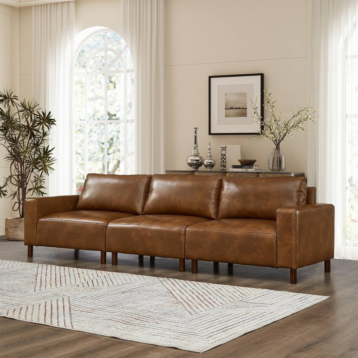 Angle. Ropilly - Ropilly 112 Inch Faux Leather Sofa Brown Three Seat Living Room Couch with Wood Legs - Brown.