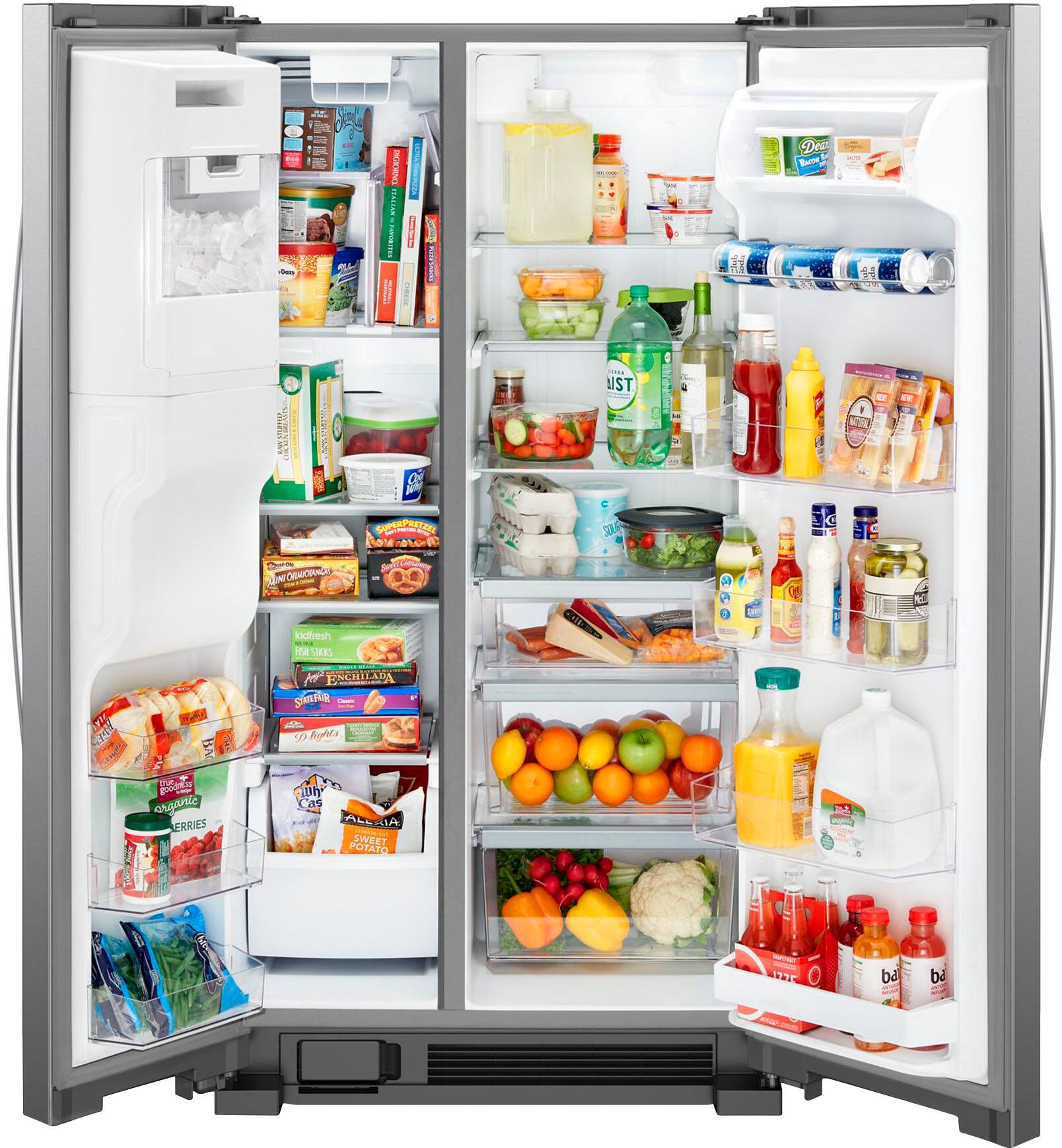 The refrigerator is filled with a variety of food items, including fruits, vegetables, and drinks. There are several bottles of juice, milk, and other beverages, as well as a bowl of fruit. The refrigerator is well-stocked and ready for use.