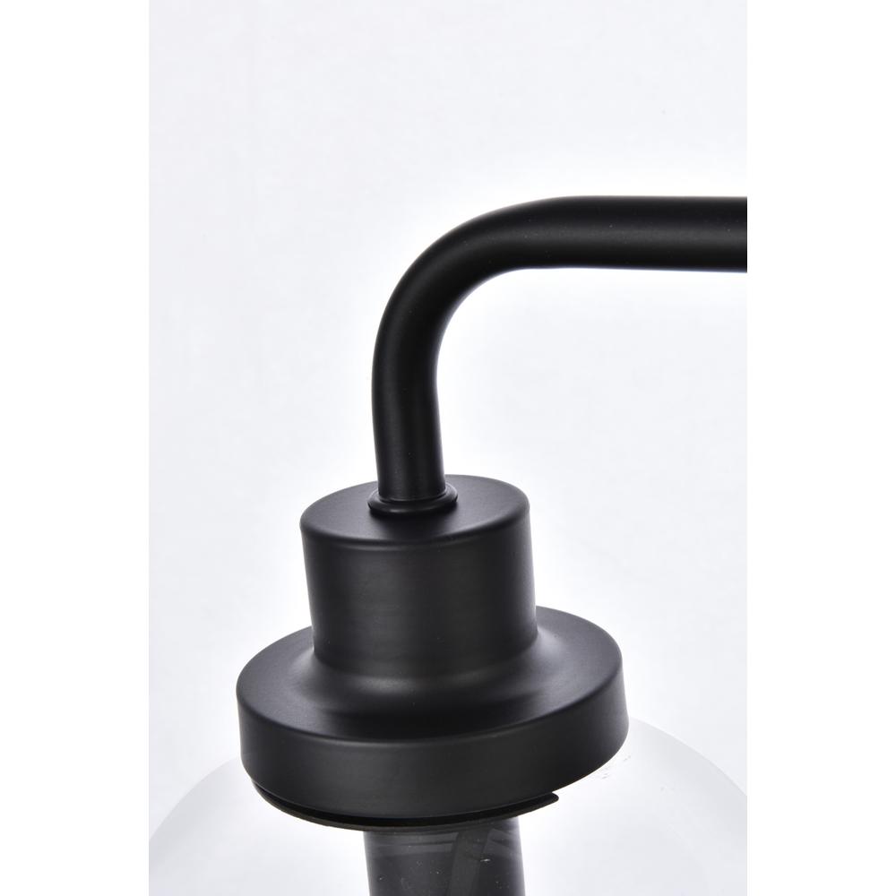 Left. Living District - Hanson 3 lights bath sconce in black with clear shade - Black And Clear Shade.