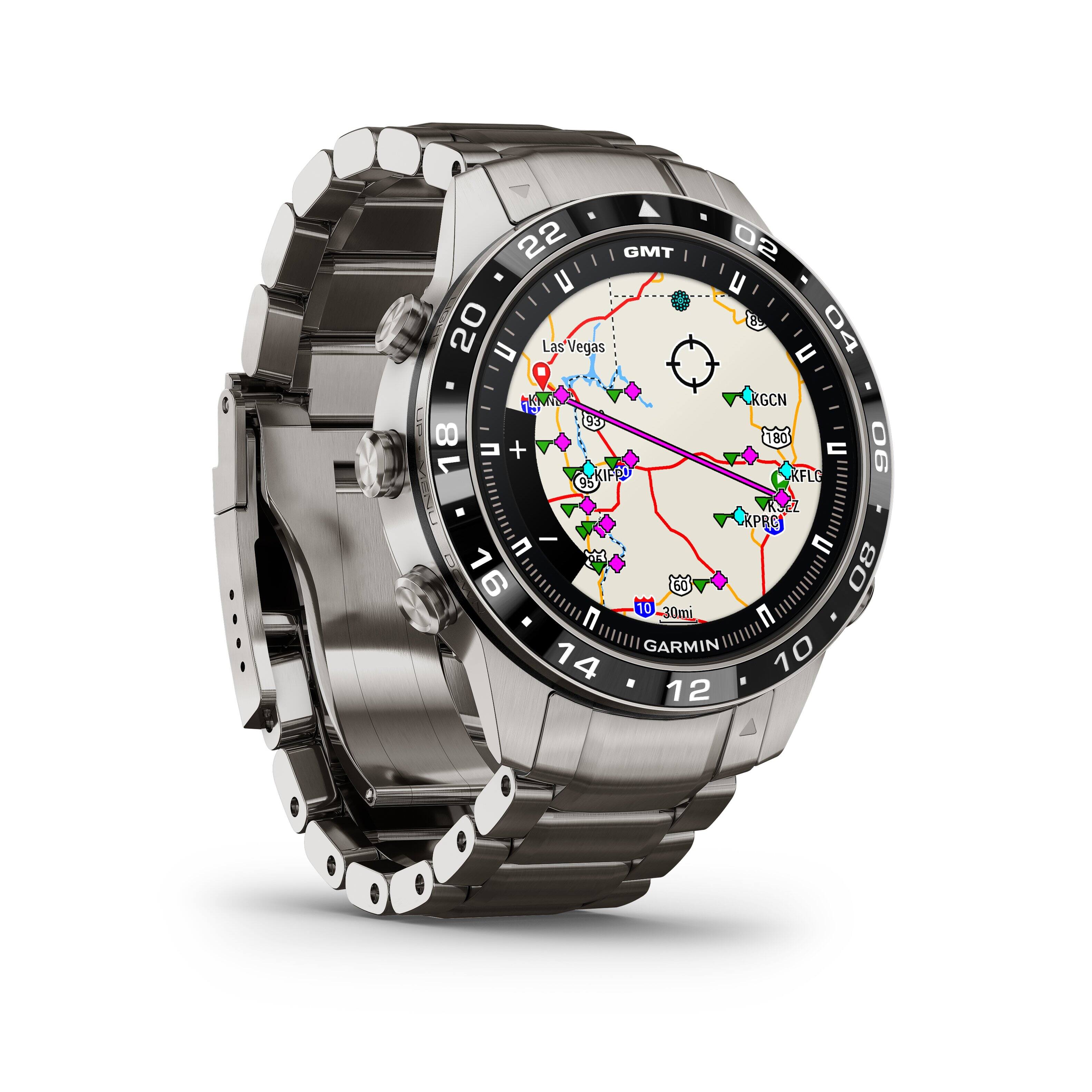 The image shows a Garmin watch displaying a map of Las Vegas. The watch is set to 22 GMT, and the map shows the city's streets and landmarks. The watch face also displays the time, which is 20:20.