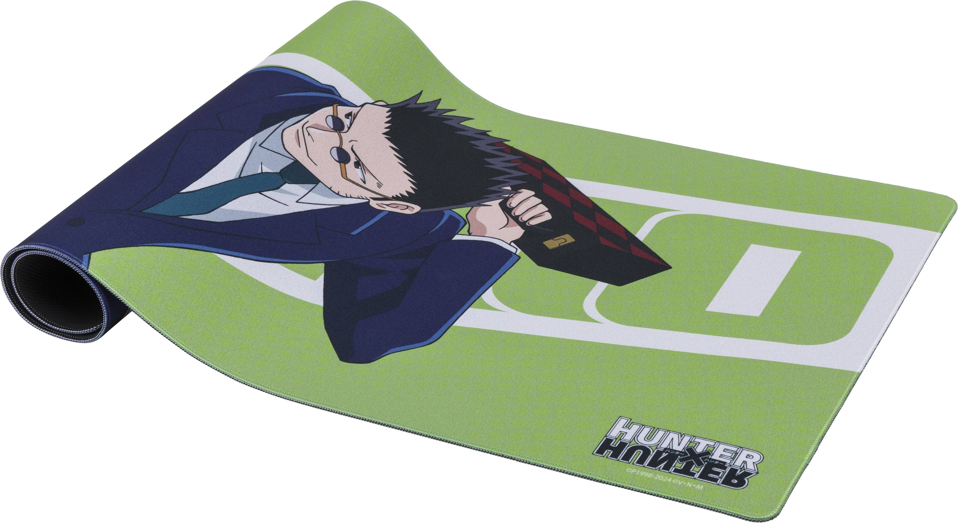 Hunter x Hunter is a popular manga and anime series that follows the story of a young boy named Gon Freecss, who is on a quest to find his missing father. The image features a green poster with a picture of the main character, Killua Zoldyck, holding a gun. The poster is rolled up and placed on a white background. The text on the image reads "Hunter x Hunter," which is the title of the series. The year 2011 is also visible in the text, indicating that the image was created or released in that year.