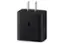 The image features a black charger with a white lightning bolt on it, indicating that it is a fast charger. The charger is designed to provide a quick and efficient charging experience for electronic devices. The charger is shown in a close-up view, highlighting its features and making it the main focus of the image.
