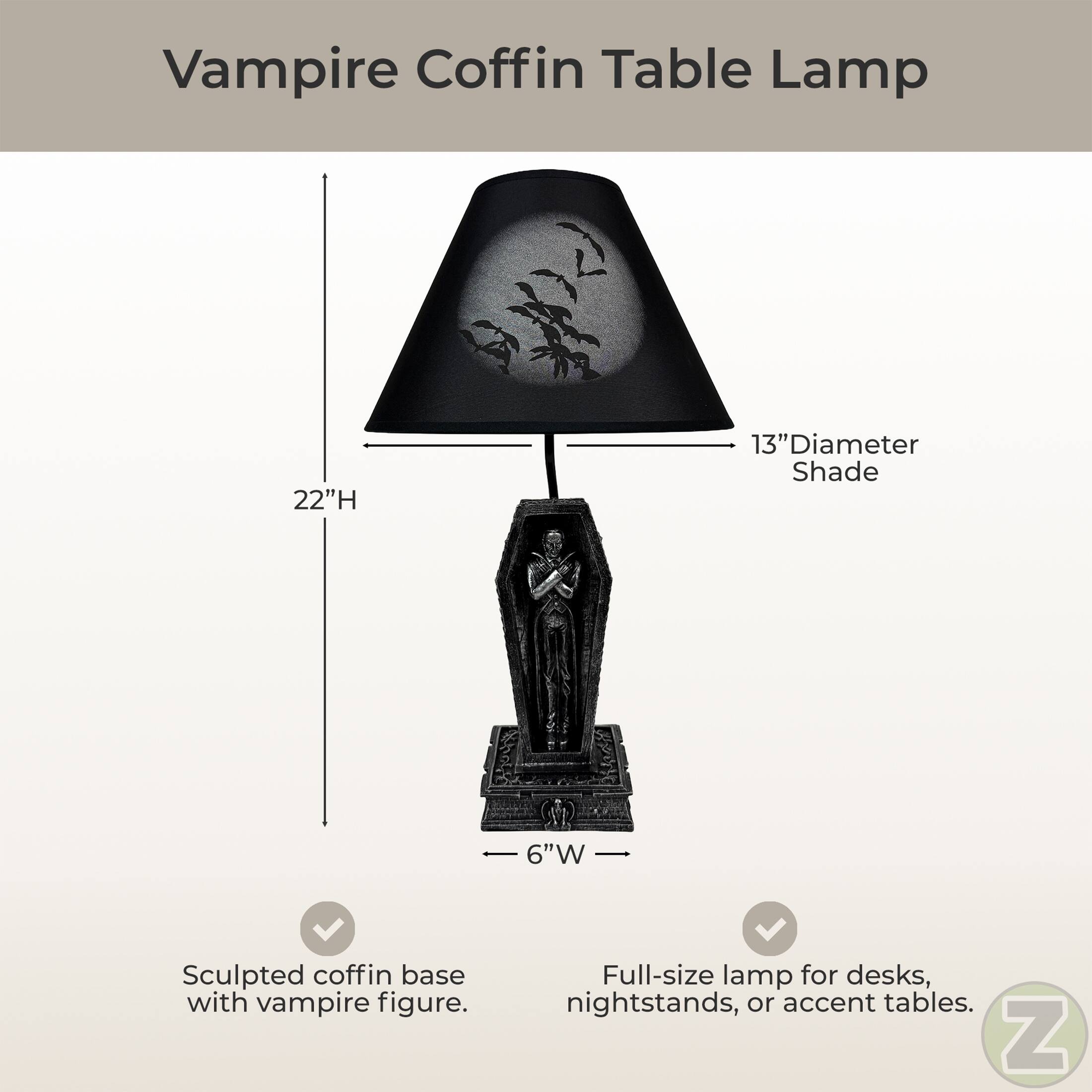 Vampire Coffin Table Lamp  
22"H 13"Diameter Shade 6"W  
Sculpted coffin base with vampire figure.  
Full-size lamp for desks, nightstands, or accent tables.