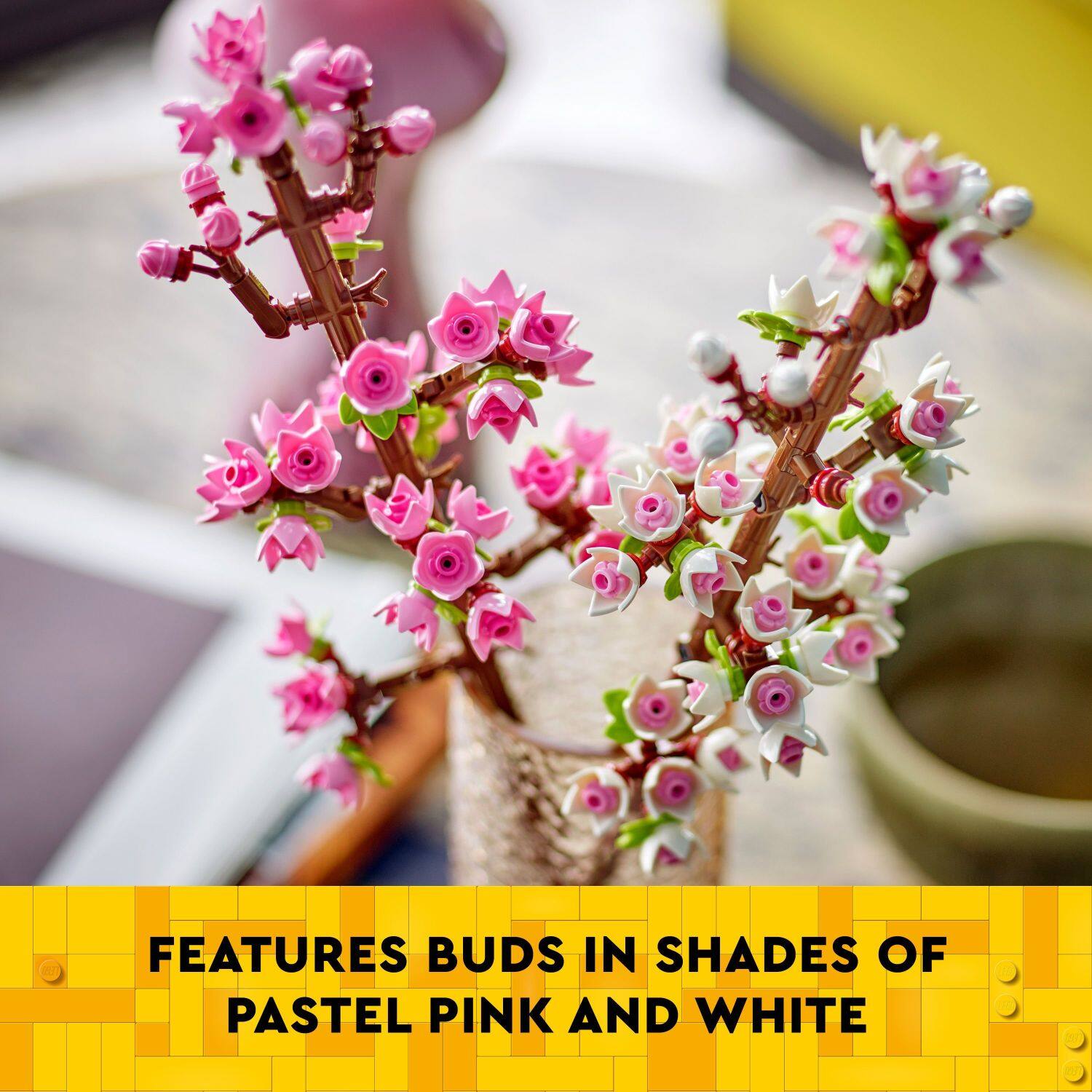 FEATURES BUDS IN SHADES OF PASTEL PINK AND WHITE