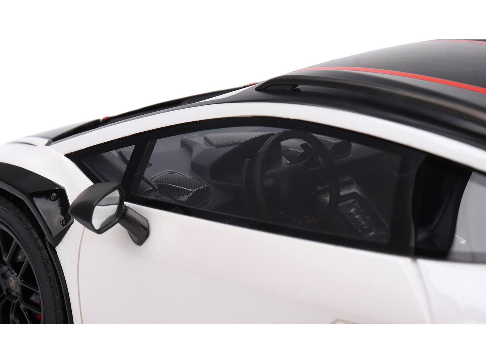 Angle. Top Speed - Lamborghini Huracan Sterrato Bianco Asopo White with Matt Black Top and Red Stripes 1/18 Model Car by Top Speed - White and Matt Black.