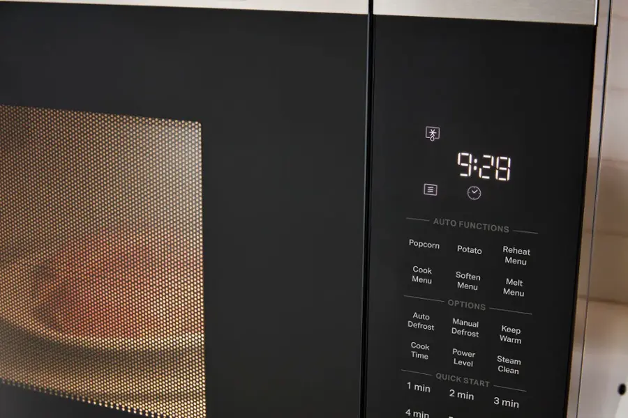 The text on the image reads:

9:28 Auto Functions
Popcorn
Potato
Reheat
Menu
Cook Menu
Soften Menu
Melt Menu

Options:
Auto Defrost
Manual Defrost
Keep Warm
Cook Time
Power Level
Steam Clean
QUICK START
1 min
2 min
3 min
4 min
-