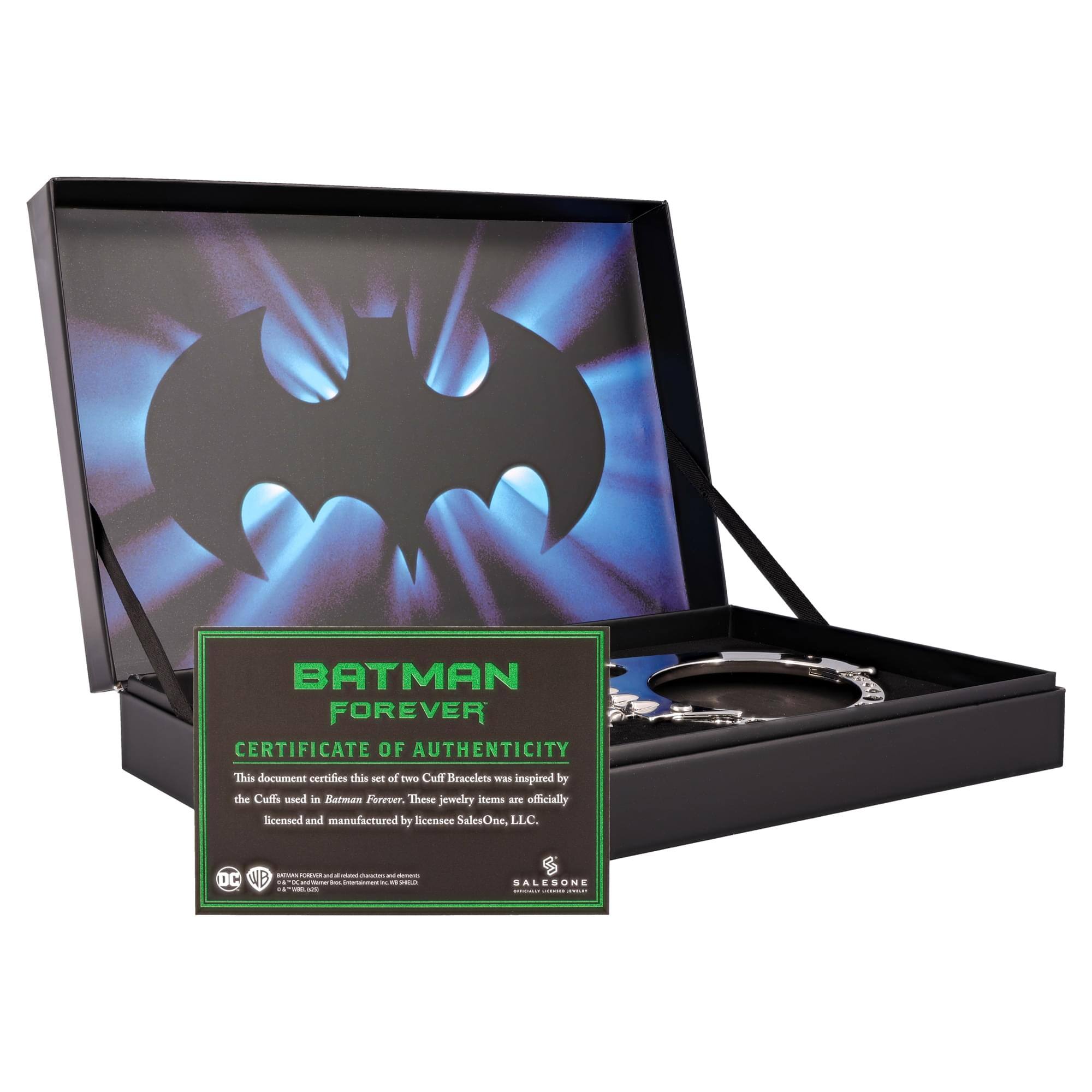 BATMAN FOREVER  
CERTIFICATE OF AUTHENTICITY  

This document certifies this set of two Cuff Bracelets was inspired by the Cuffs used in Batman Forever. These jewelry items are officially licensed and manufactured by licensee SalesOne, LLC.  

DC  
WB  
SALESONE