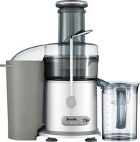 Juicer with outlet extractor