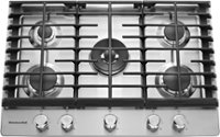 The image features a stainless steel gas cooktop with six burners. The burners are arranged in a circular pattern, with three on the left side, two on the right side, and one in the center. The cooktop is clean and ready for use, making it an ideal appliance for preparing meals in a kitchen.