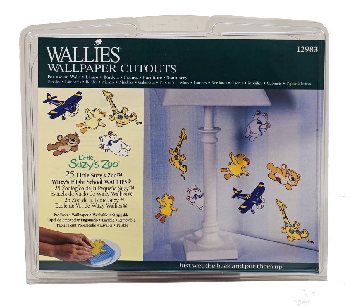 12983 WALLIES WALLPAPER CUTOUTS  
For use on Walls, Lamps, Borders, Frames, Furniture, Stationery  
Paredes, Lamparas, Bordes, Marcos, Muebles, Gabinetes, Papeleria  
Murs, Lampes, Bordures, Cadres, Mobilier, Cabinets, Papier à lettres  

Little Suzy's Zoo  
25 Little Suzy's Zoo™  
Witzy's Flight School WALLIES®  
25 Zoológico de la Pequeña Suzy™  
Escuela de Vuelo de Witzy Wallies®  
25 Zoo de la Petite Suzy™  
École de Vol de Witzy Wallies®  

Pre-Pasted Wallpaper Washable Strippable  
Papel de Empapelar Engomado Lavable Removible  
Papier Peint Pr-Encoll Lavable Pelable  

Just wet the back and put them up!