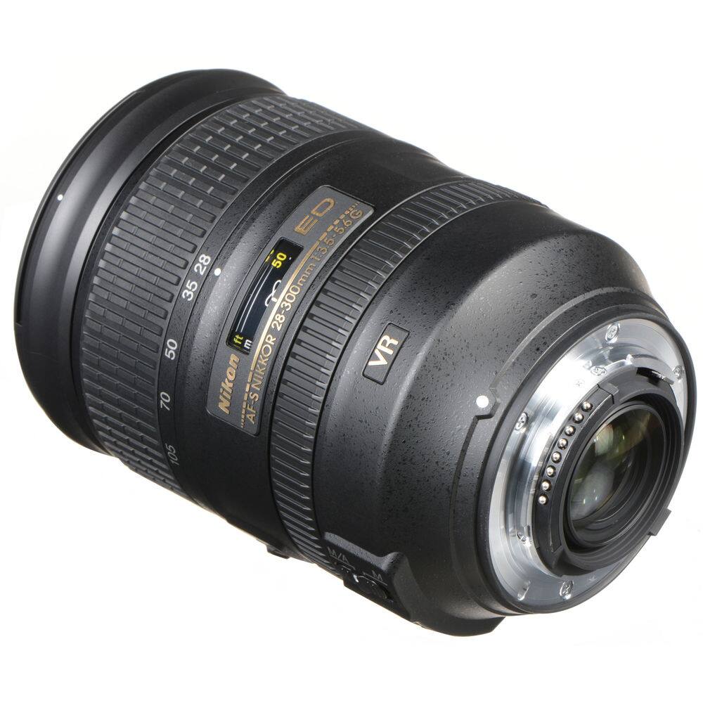 ED G 29 5 5.6 50 1:3 28 mm 35 3 28-300 ft E 50 VR 70 Nikon AF-S NIKKOR 105 e MA

Corrected:
ED G 29 5 5.6 50 1:3 28-300mm 35 3 70 Nikon AF-S NIKKOR 105 e MA VR