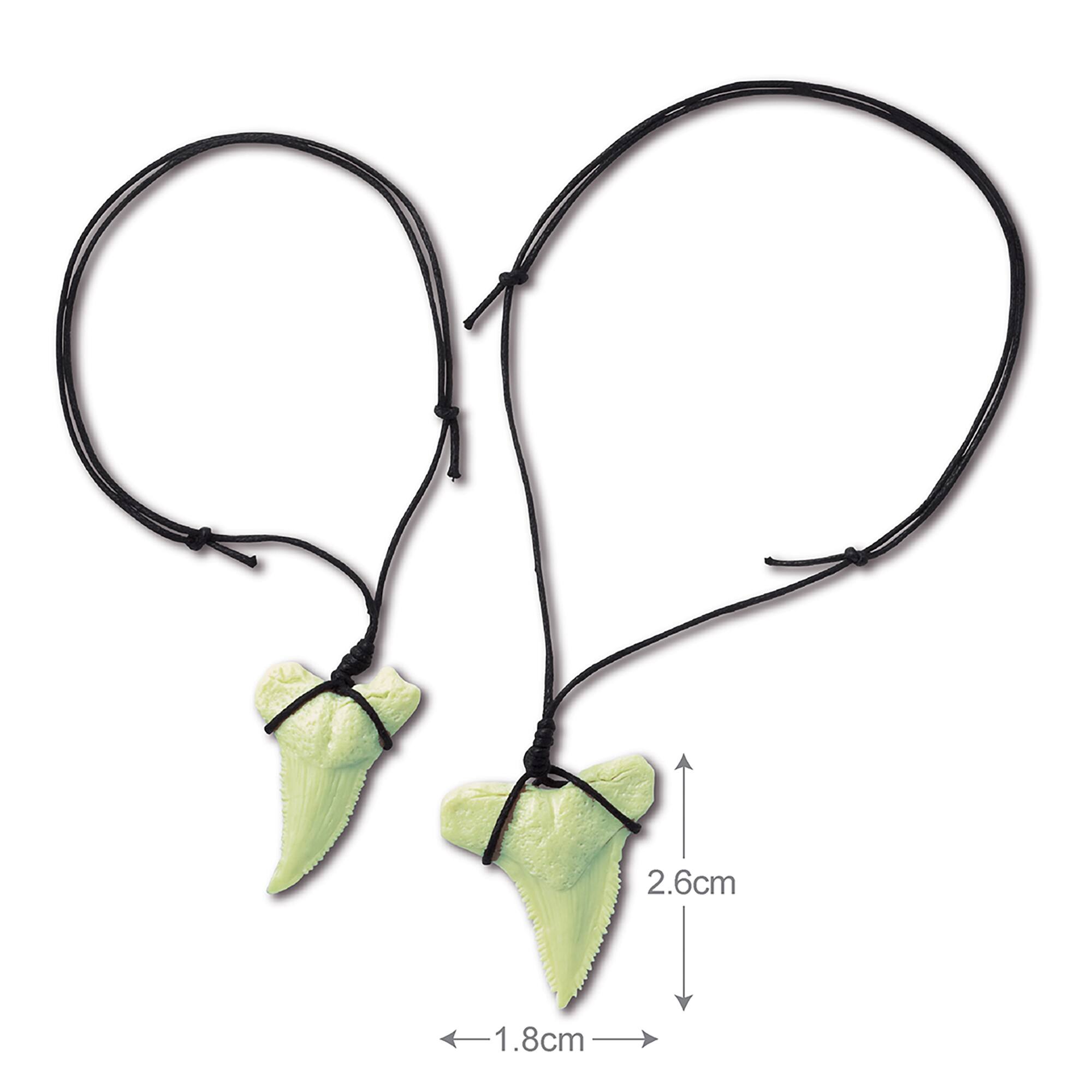 The text on the image reads "2.6cm 1.8cm," which indicates the length of the two black strings.