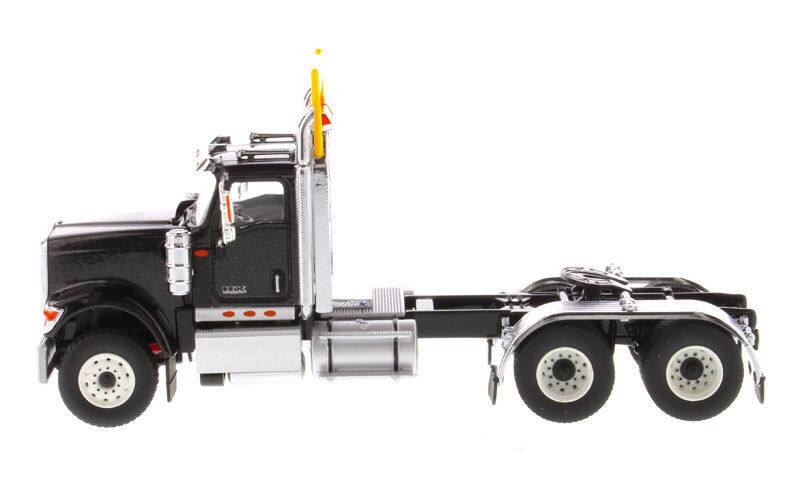 Alt View 2. Diecast Masters - International HX520 Day Cab Tandem Tractor Black 1/50 Diecast Model by Diecast Masters.