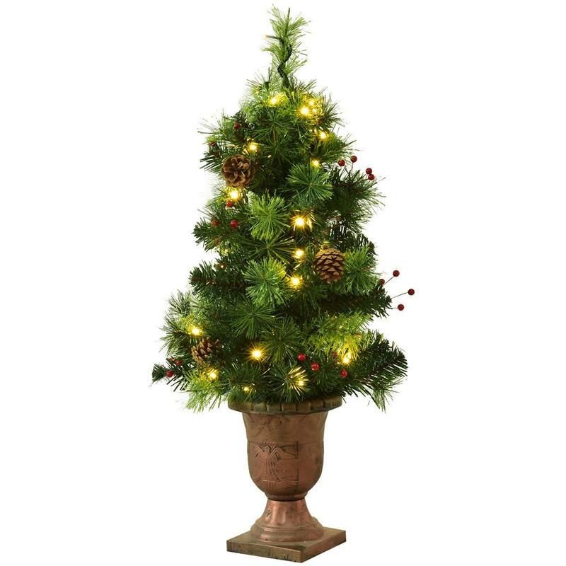 Left. WELLFOR - 3 ft Pre‑Lit Pre‑Decorated Artificial Christmas Tree with Warm‑White LEDs, Red Berries & Pine Cones - Green.