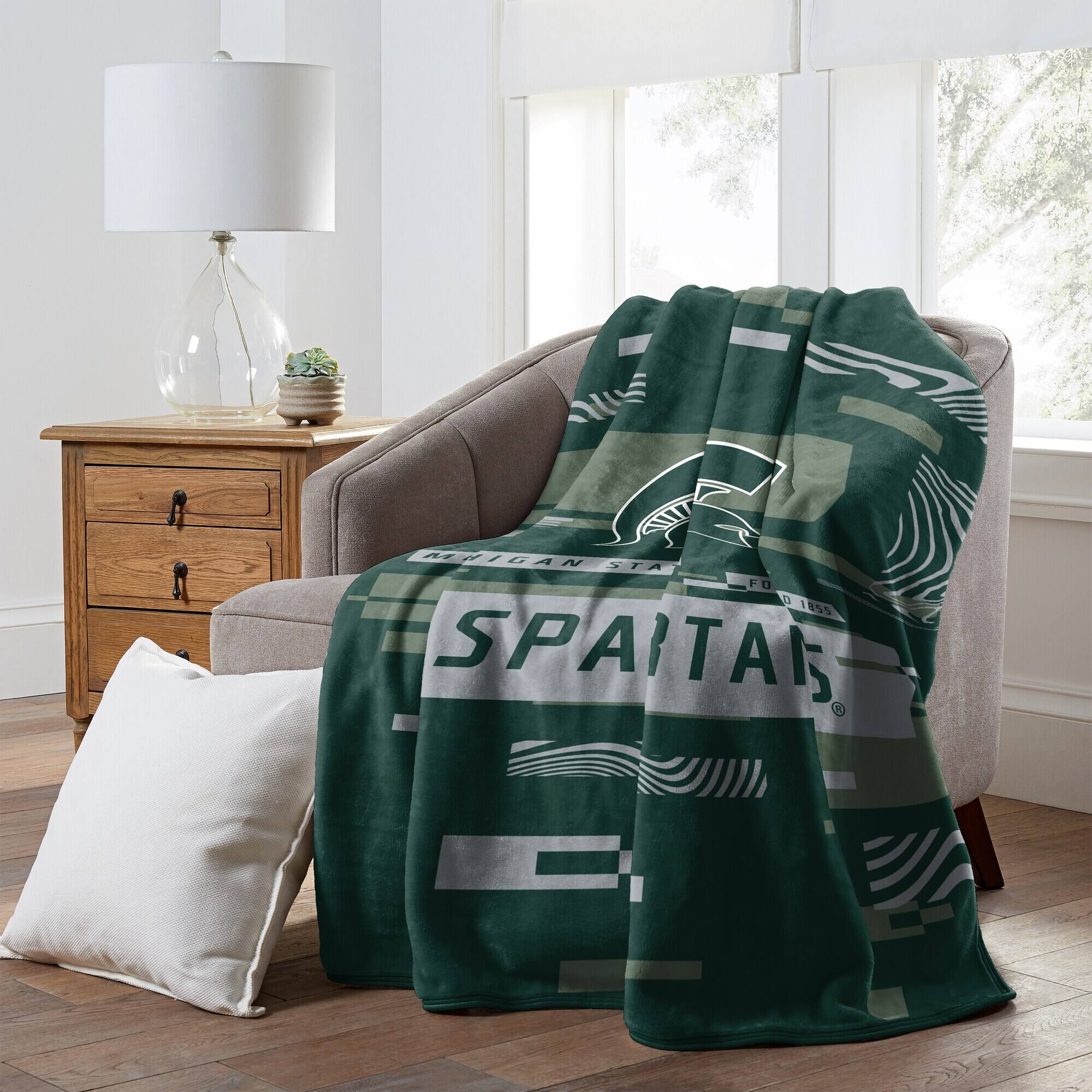 MICHIGAN STATE  
FOUNDED 1855  
SPARTANS