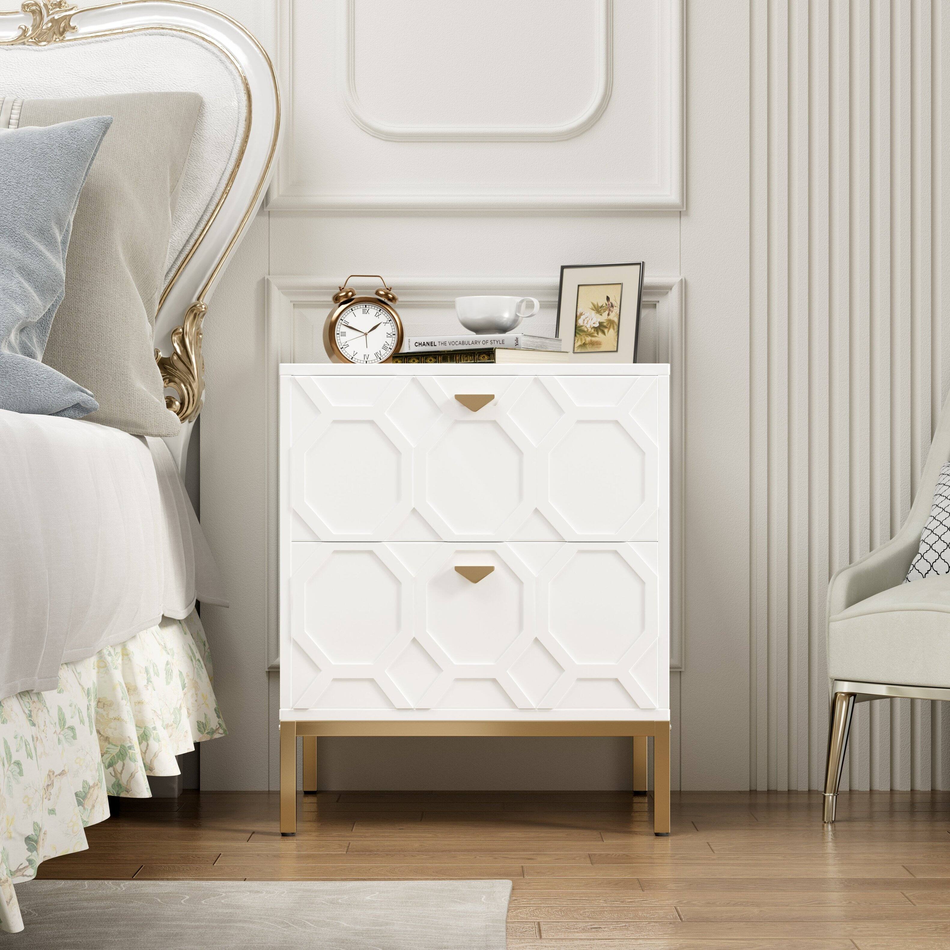 The image features a bedroom with a bed, a dresser, and a clock. The dresser has a clock on top of it, and there is a cup on the dresser as well. The bed is positioned next to the dresser, and there is a chair in the room. The scene is predominantly white, giving it a clean and minimalist appearance.