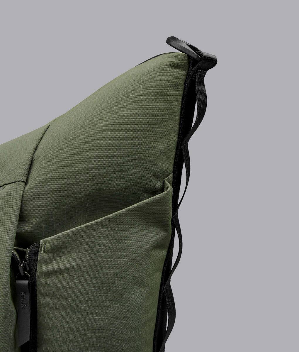 Left. ALPAKA - Flow Satchel 10L Shoulder Bag for 13" Laptop with Water Bottle Holder - Green.