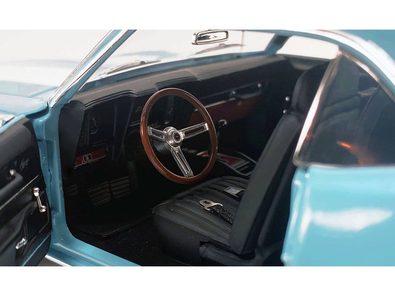 Left. ACME - 1969 Chevrolet Camaro Z/28 Carolina Blue with White Stripes Limited Edition to 420 pieces Worldwide 1/18 - Blue and White.