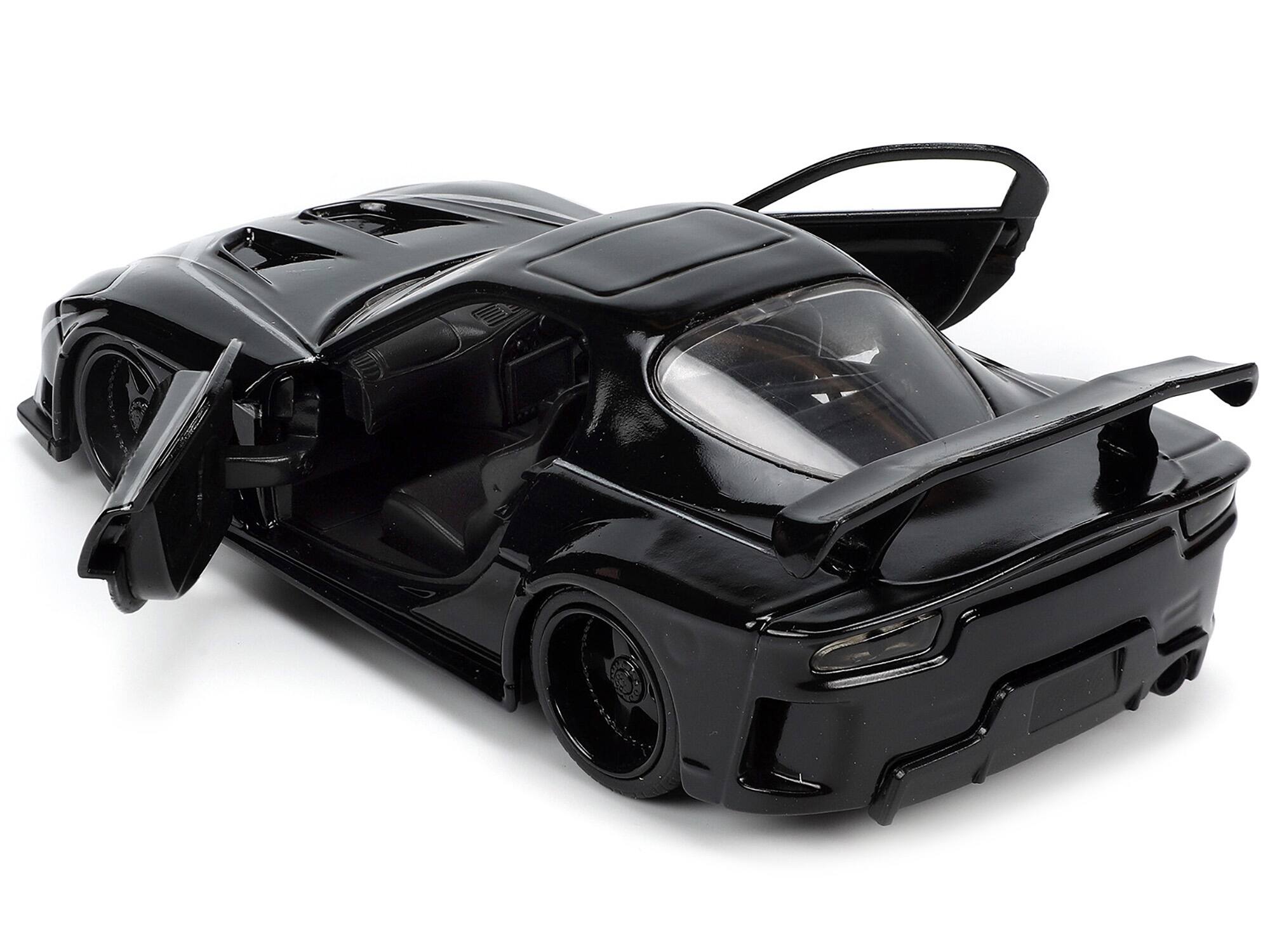 Left. Jada - 1995 Mazda RX-7 RHD Black with Black Panther Diecast Figure "The Avengers" "Hollywood Rides" Series 1/32 - Black.