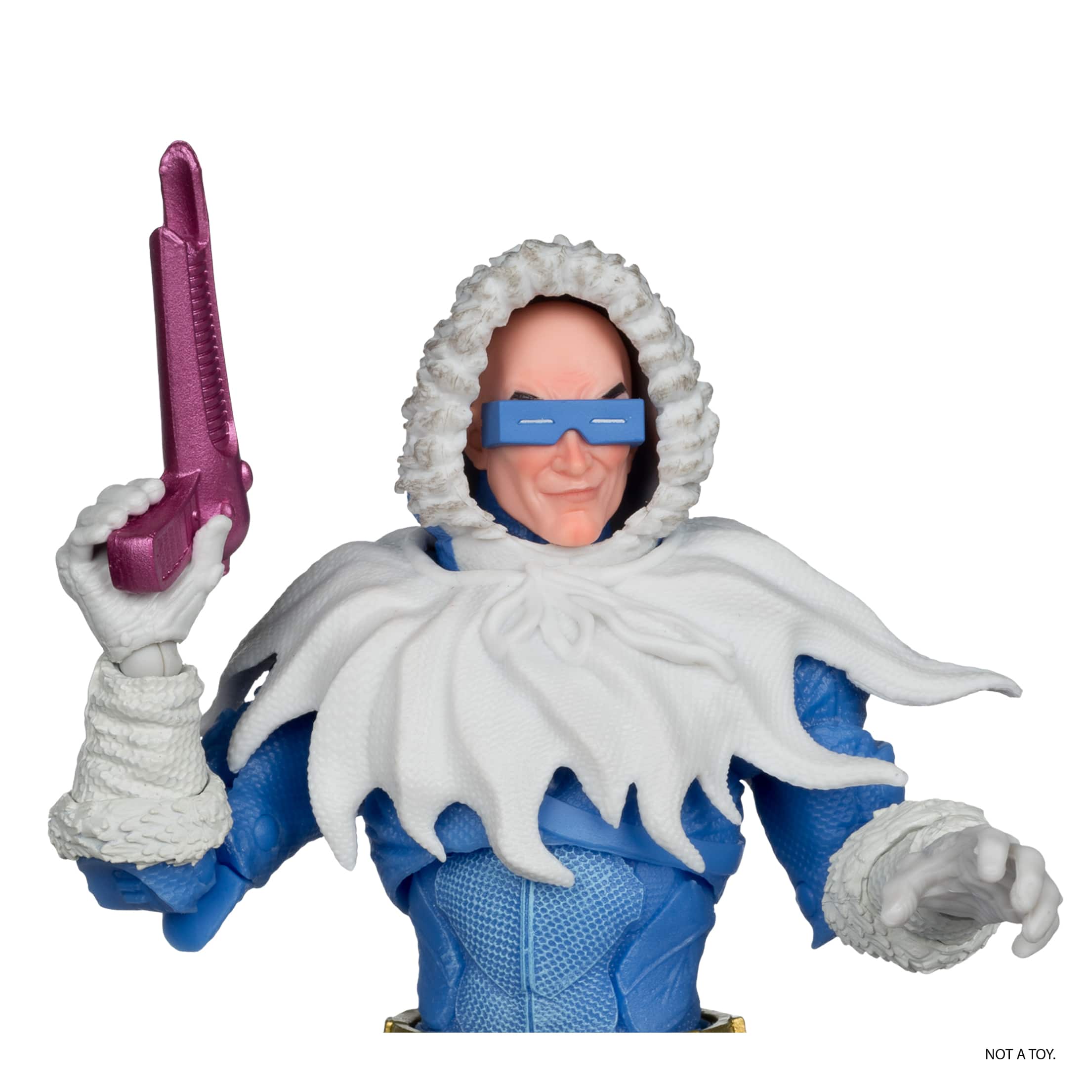 The image features a toy figure of a man wearing a blue and white costume, holding a purple gun. The toy is posed in a way that it appears to be a real person, but it is not a real person. It is a toy designed to resemble a person in a costume, holding a gun.