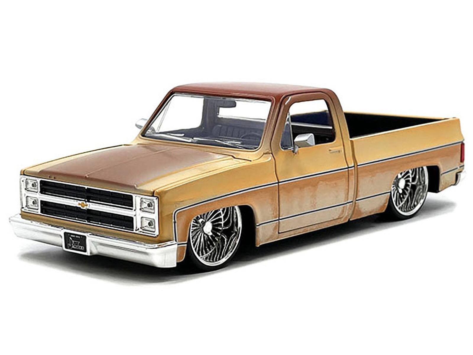 Angle. Jada - 1985 Chevrolet C-10 Pickup Truck Yellow with Brown Top (Rusted) and Daytona Wire Wheels "Just Trucks" Series 1/24 - Yellow And Brown.