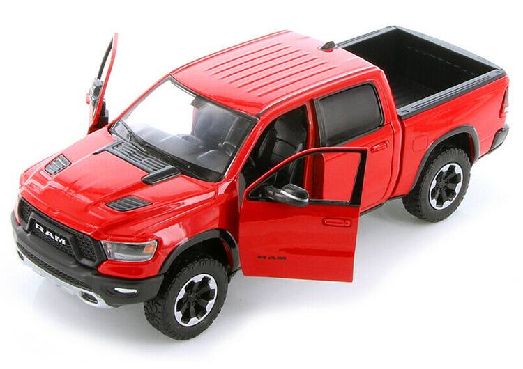 Alt View 1. Motormax - 2019 RAM 1500 Rebel Crew Cab Pickup Truck Red 1/24 Diecast Model Car by Motormax.