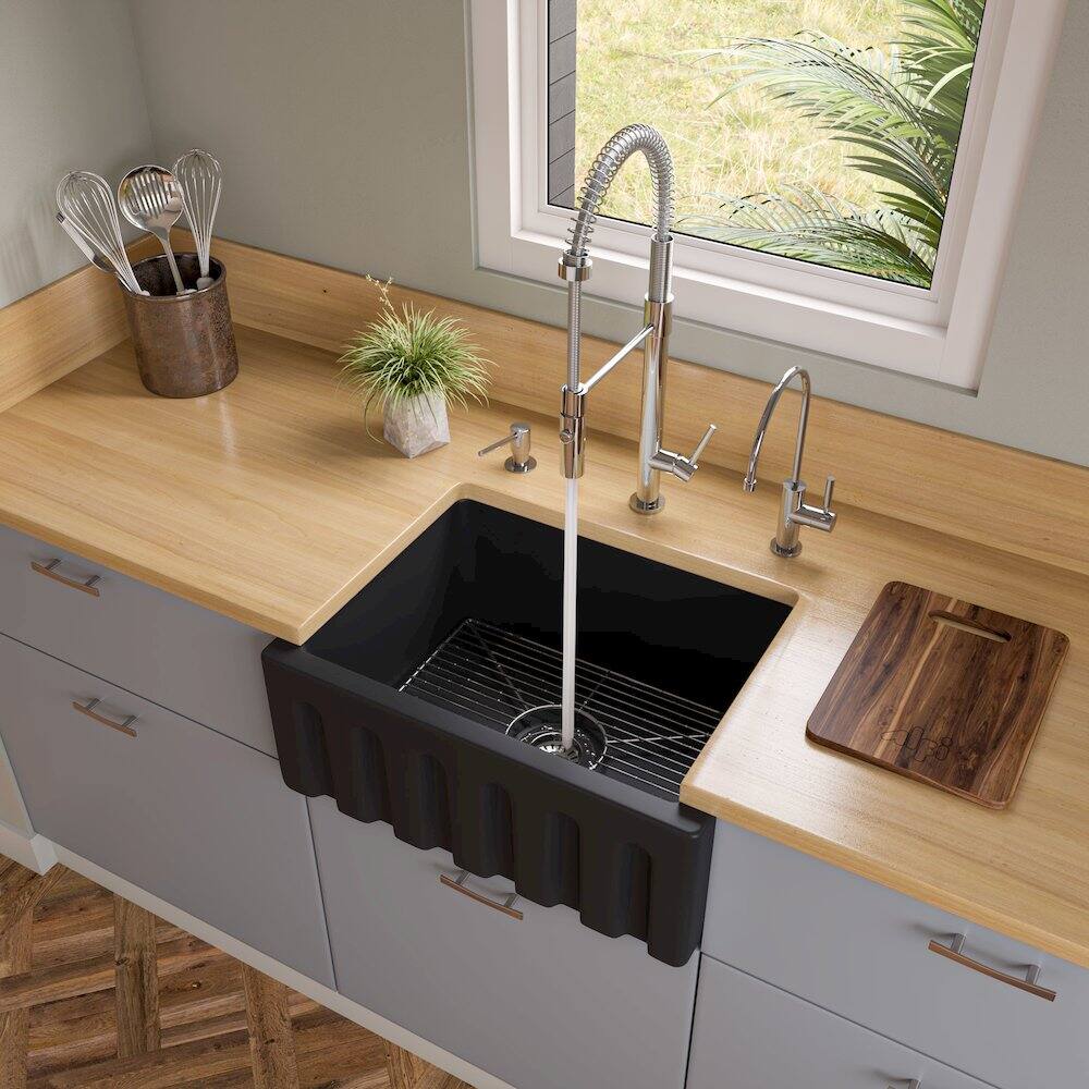 Left. Alfi - 24" Black Matte Reversible Smooth / Fluted Single Bowl Fireclay Farm Sink - Black.