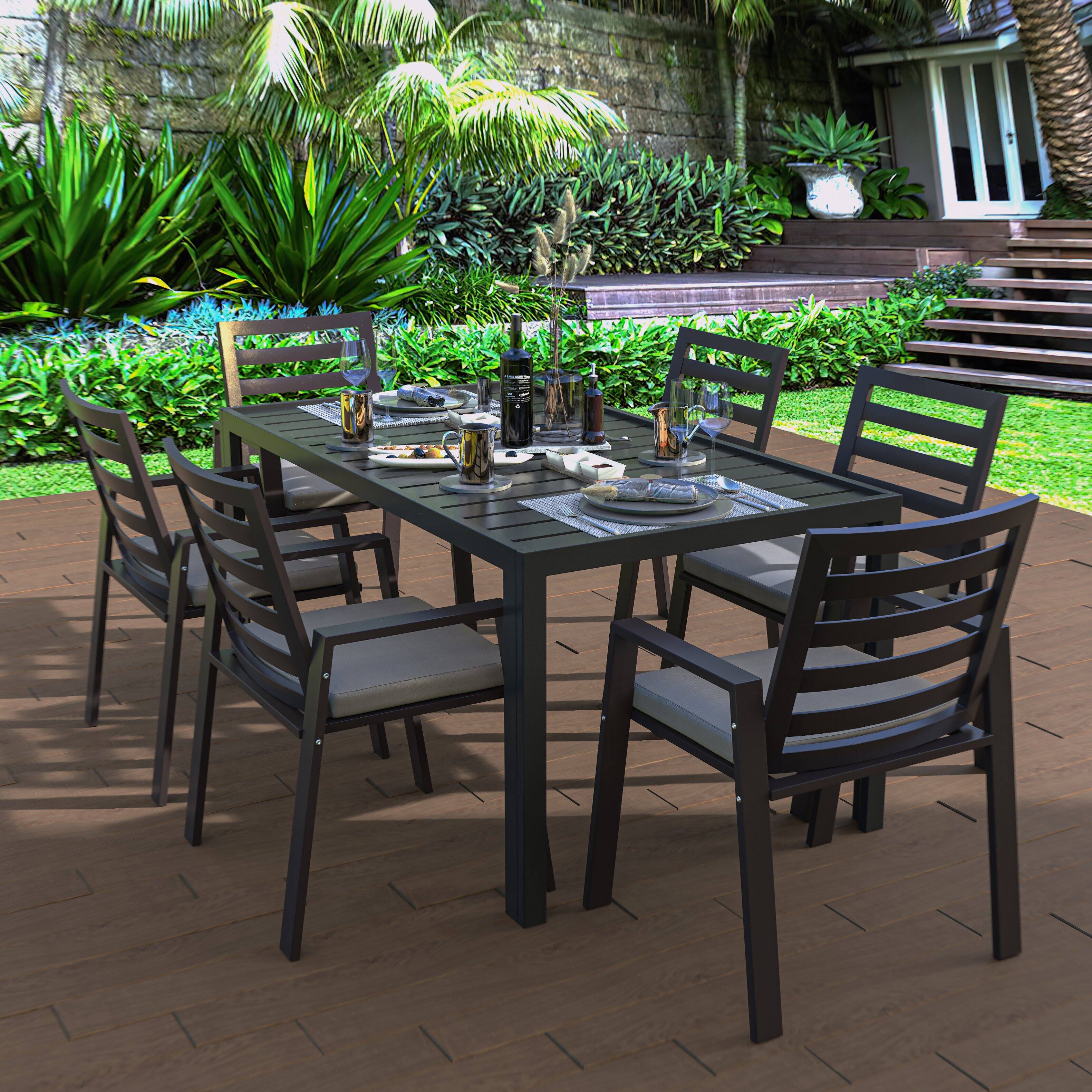 Left. LeisureMod - Chelsea Mid-Century Modern Patio Dining Armchair with Weather-Resistant Olefin Cushion - Aluminum - Black.