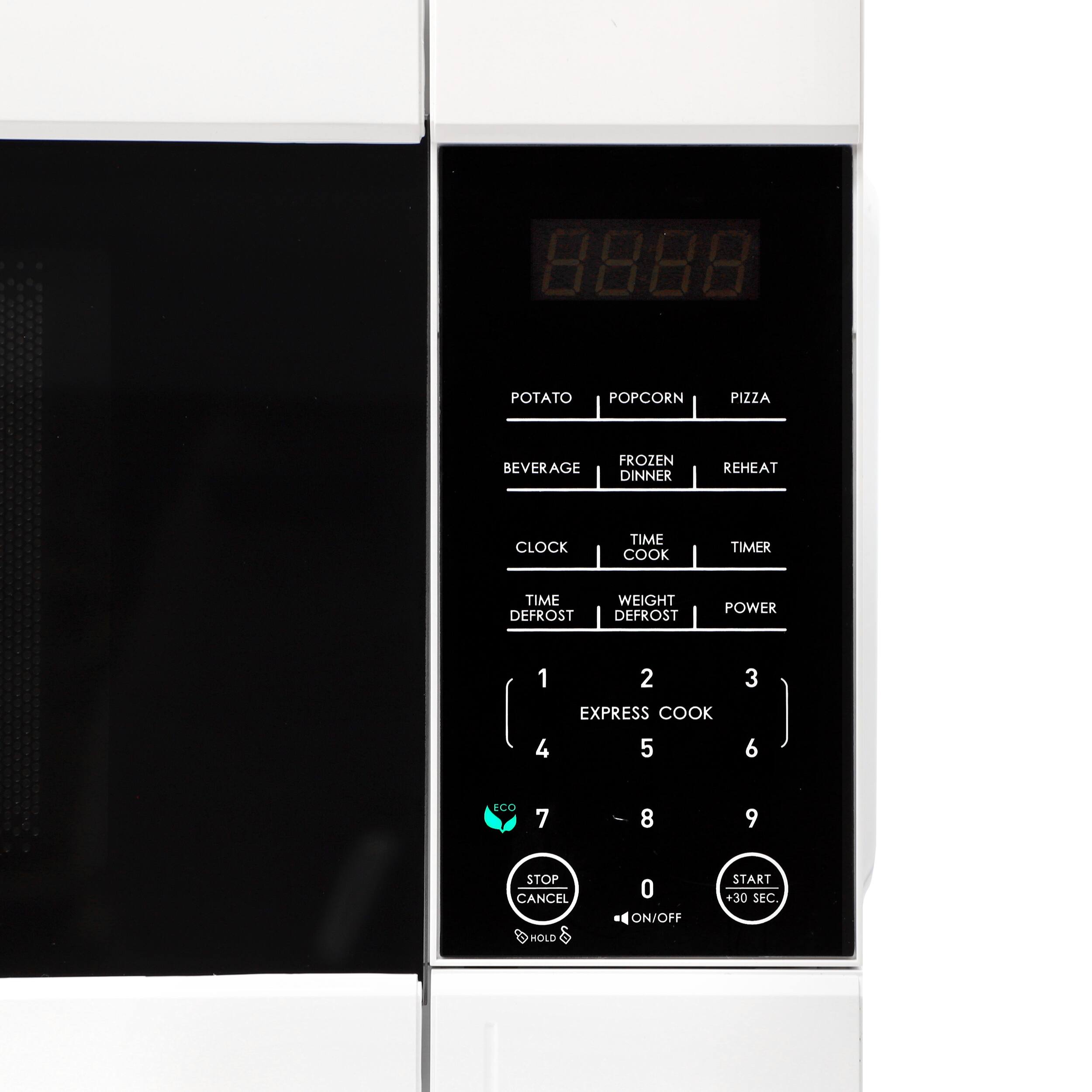 POTATO POPCORN PIZZA BEVERAGE FROZEN DINNER REHEAT CLOCK TIME COOK TIMER TIME DEFROST WEIGHT DEFROST POWER 1 2 3 EXPRESS COOK 4 5 6 7 8 9 STOP CANCEL HOLD 0 ON/OFF START +30 SEC.