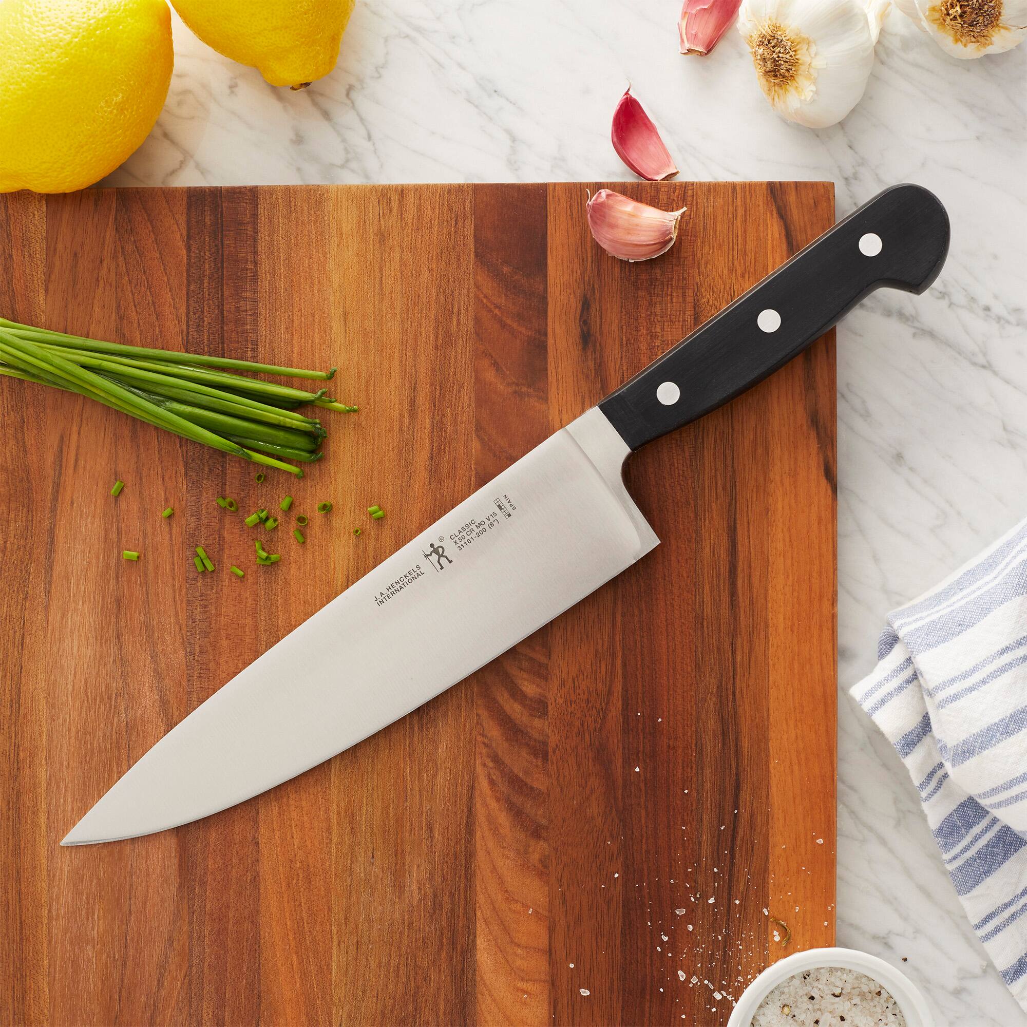 Alt View 1. Henckels - HENCKELS Classic Razor-Sharp 8-inch Chef's Knife, German Engineered Informed by 100+ Years of Mastery - Black.