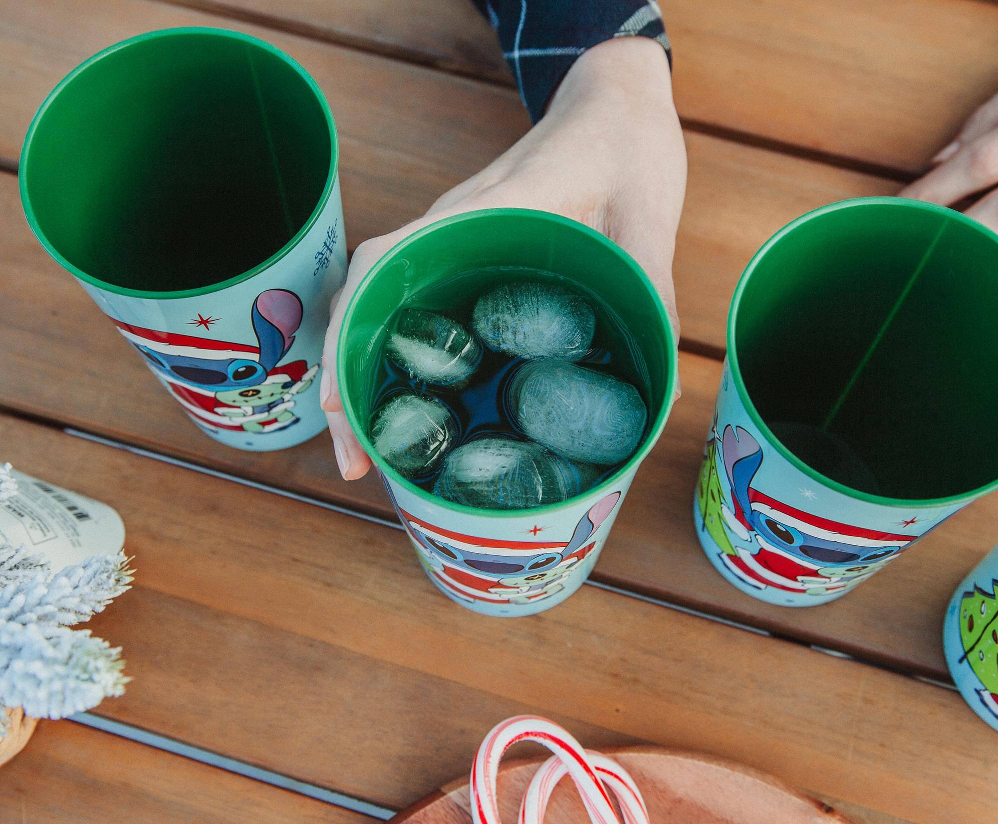 Alt View 4. Silver Buffalo - Disney Lilo & Stitch Santa Stitch 4-Piece Plastic Cup Set | Each Holds 22 Ounces - Blue.