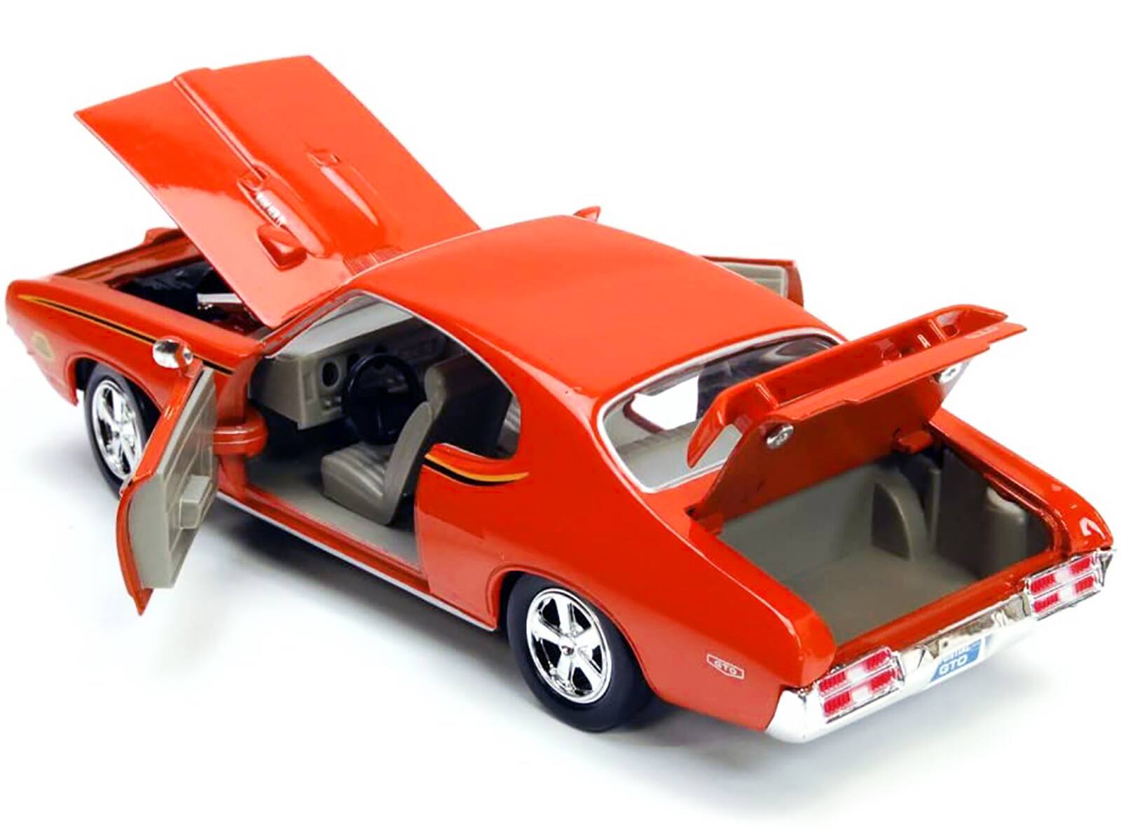 Left. Motormax - 1969 Pontiac GTO Judge Orange with Stripes 1/24 Diecast Model Car by Motormax - Orange.