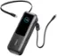 The image shows a black Anker 165W power bank with a USB cable attached to it. The power bank is fully charged and ready for use. The USB cable is connected to the power bank, indicating that it is ready to charge a device.