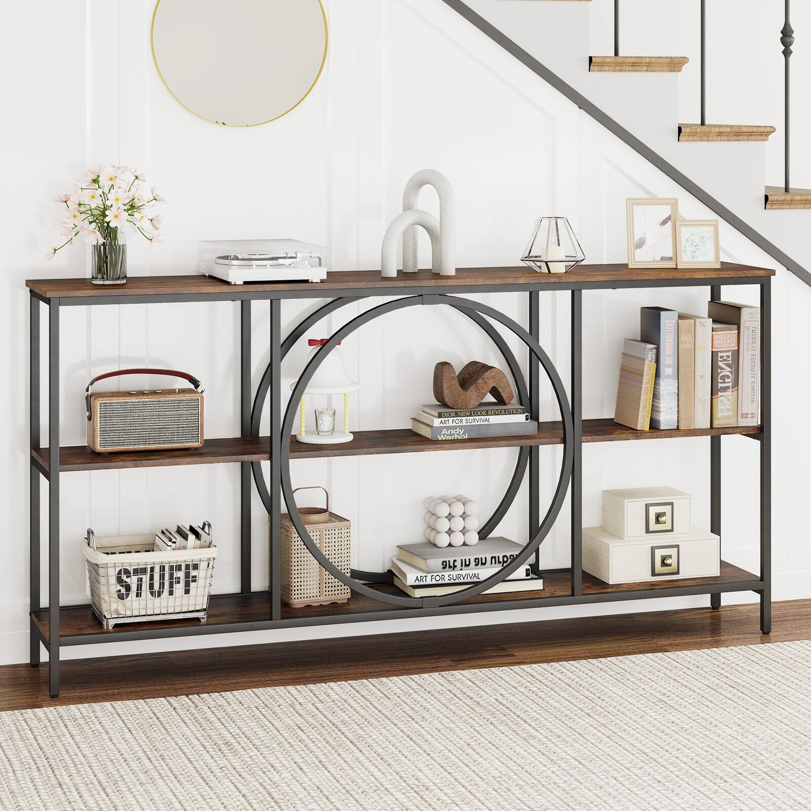 Sure, here is the corrected and grouped text from the image:

**Top Shelf:**
- "RRITS T50 N LE ESNX - ART TOE SURVIVAL"
- "Andy Warhol MCEVOLEA"

**Middle Shelf:**
- "Rd C ENGLISH"

**Bottom Shelf:**
- "STUFF"

**Books:**
- "ART FOR SURVIVAL"
- "BOOK NEW YORK REVOLUTION"
- "EXCELLENT"

**Other Text:**
- "ART FOR SURVIVAL" (on the stack of books)