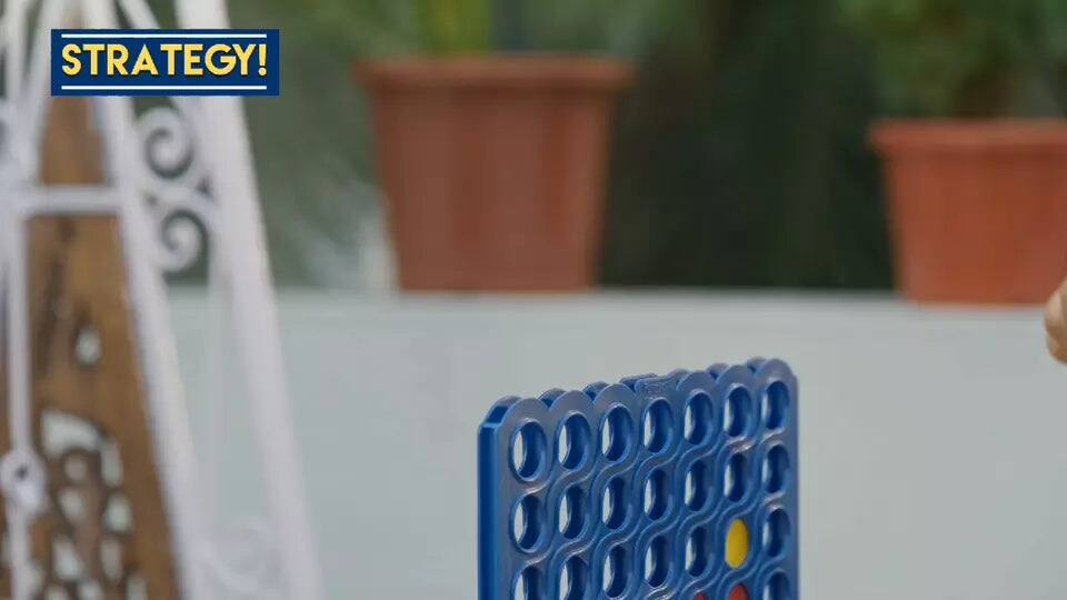 Angle. Amber Sporting Goods - Strike 4, Classic Disc Dropping Game, 4 in a Row, Family Strategy Game - Multicolor.