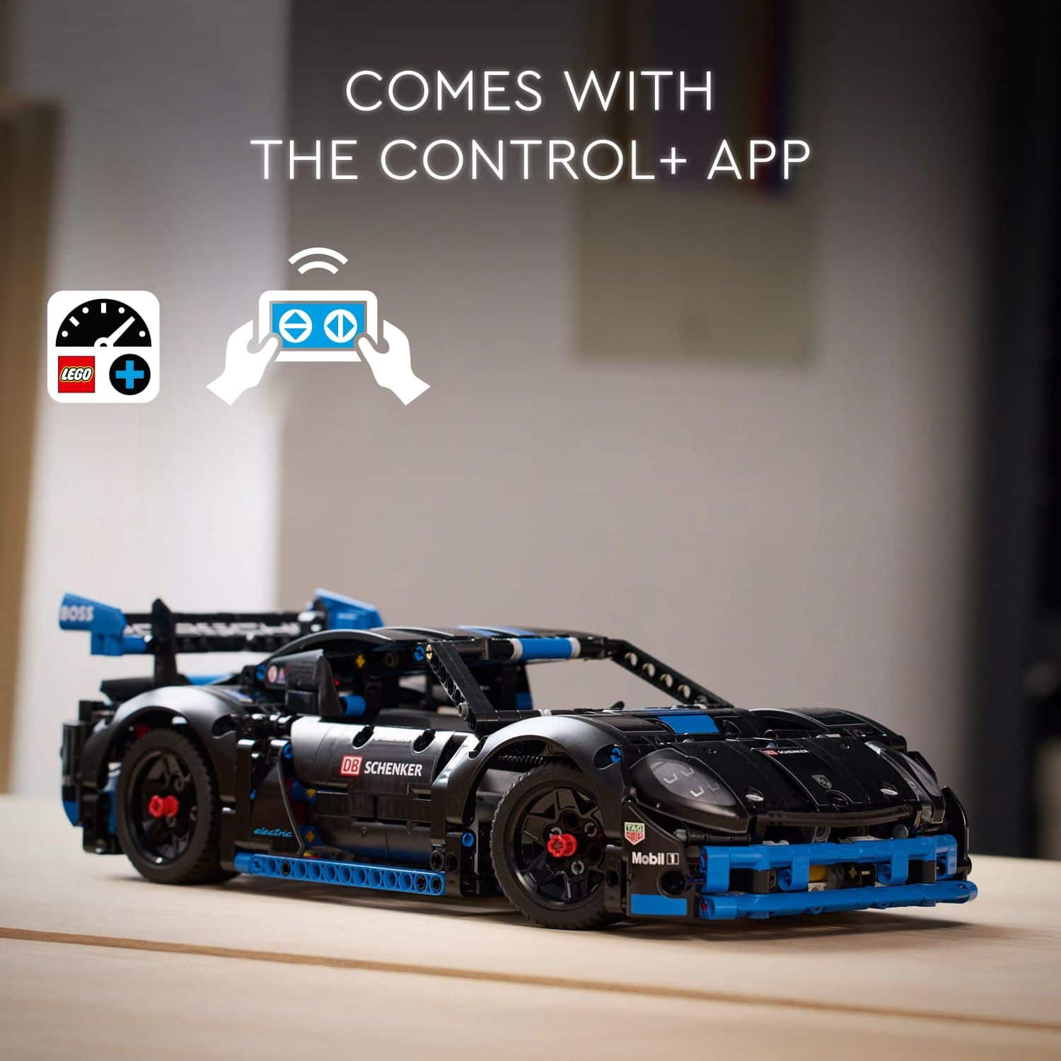 The text on the image reads: "Comes with the Control+ + App Lego + Boss 06 Schenker D Mobil 1."