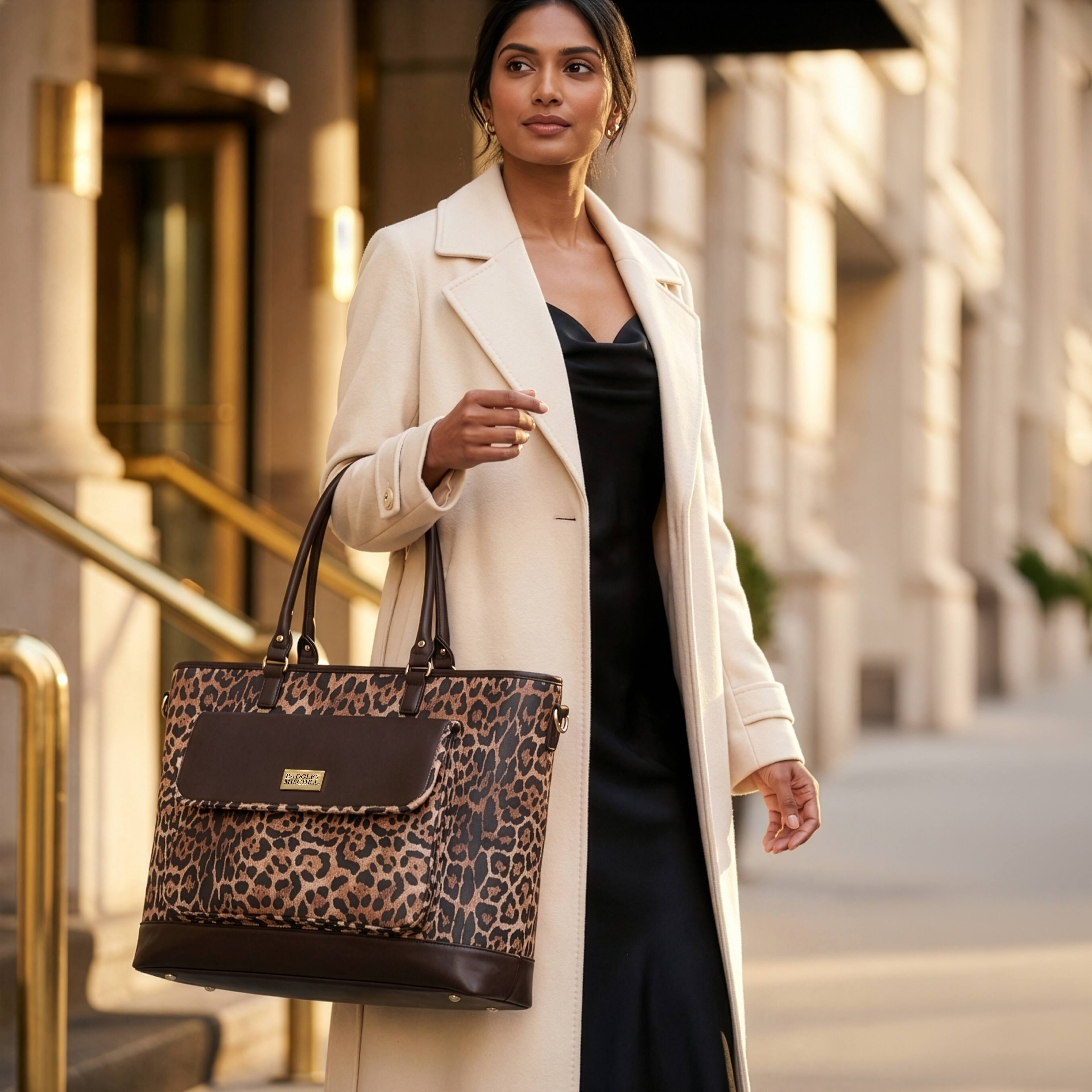 Angle. Badgley Mischka - BADGLEY MISCHKA Leopard Lux Weekender Bag, Vegan Leather Duffel with Trolley Sleeve - Brown.