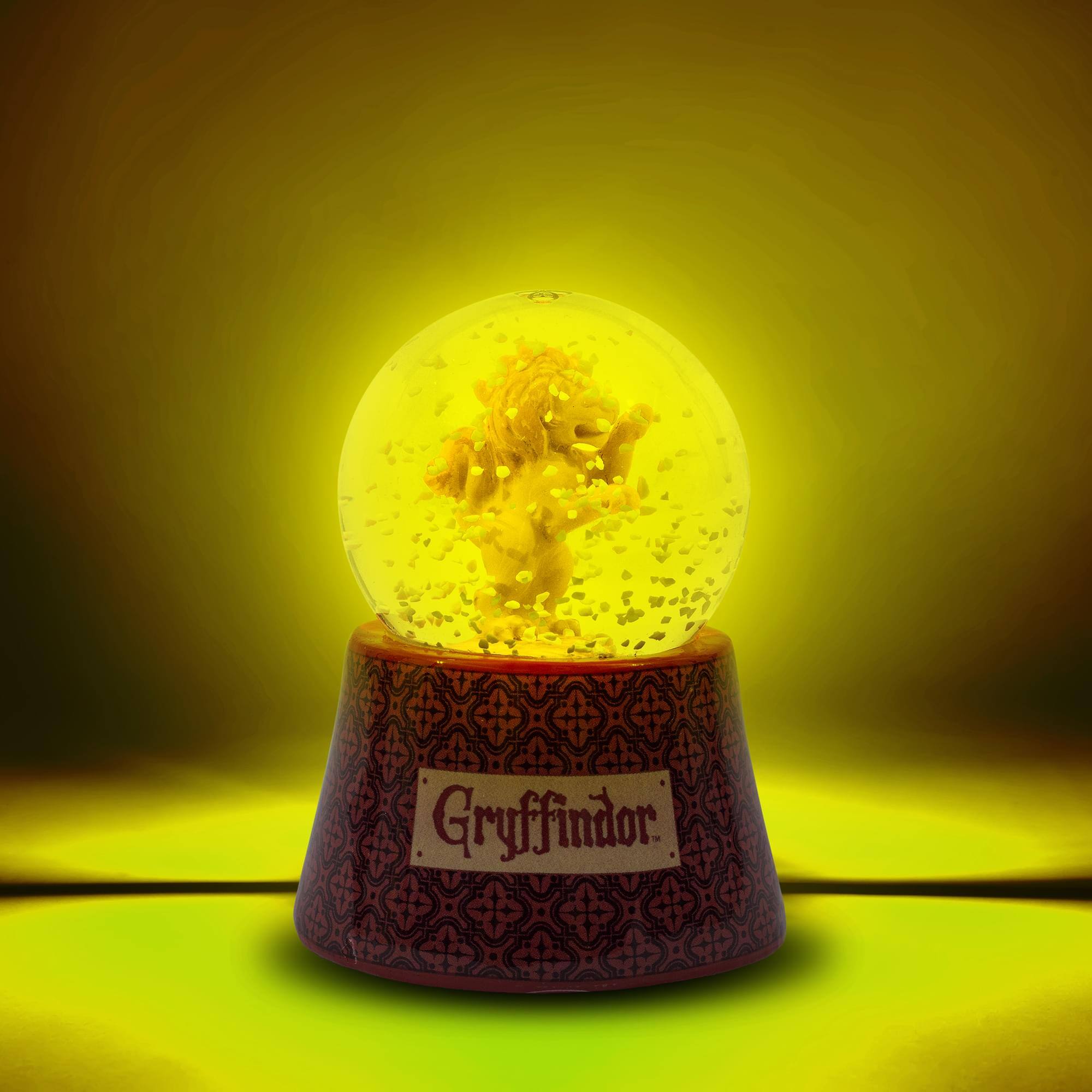 Alt View 1. Silver Buffalo - Harry Potter House Gryffindor 3-Inch Mini Light-Up Snow Globe - Red.