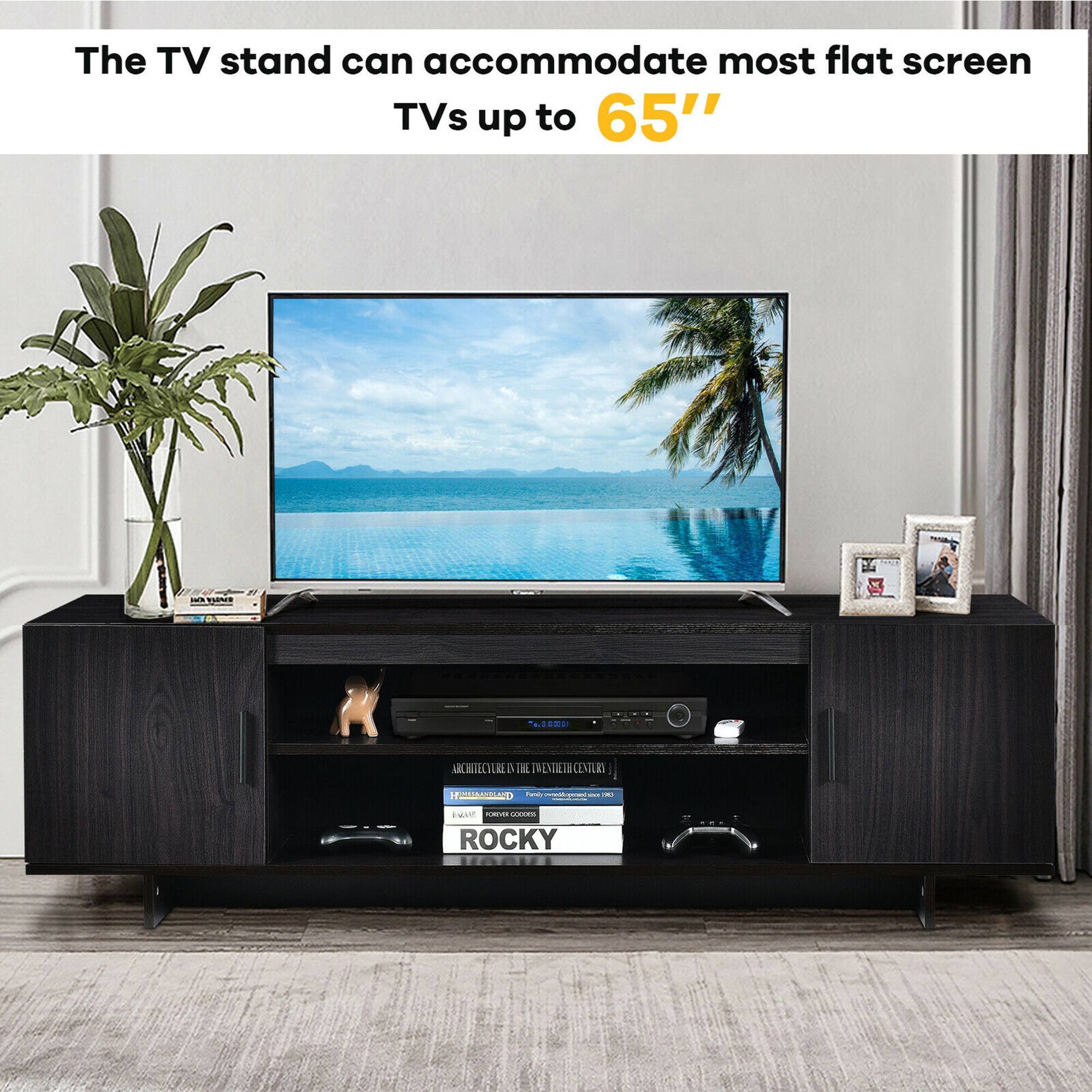 The TV stand can accommodate most flat screen TVs up to 65". The TV stand is made of wood and can hold a large screen TV. The stand is designed to hold a TV up to 65" in size.