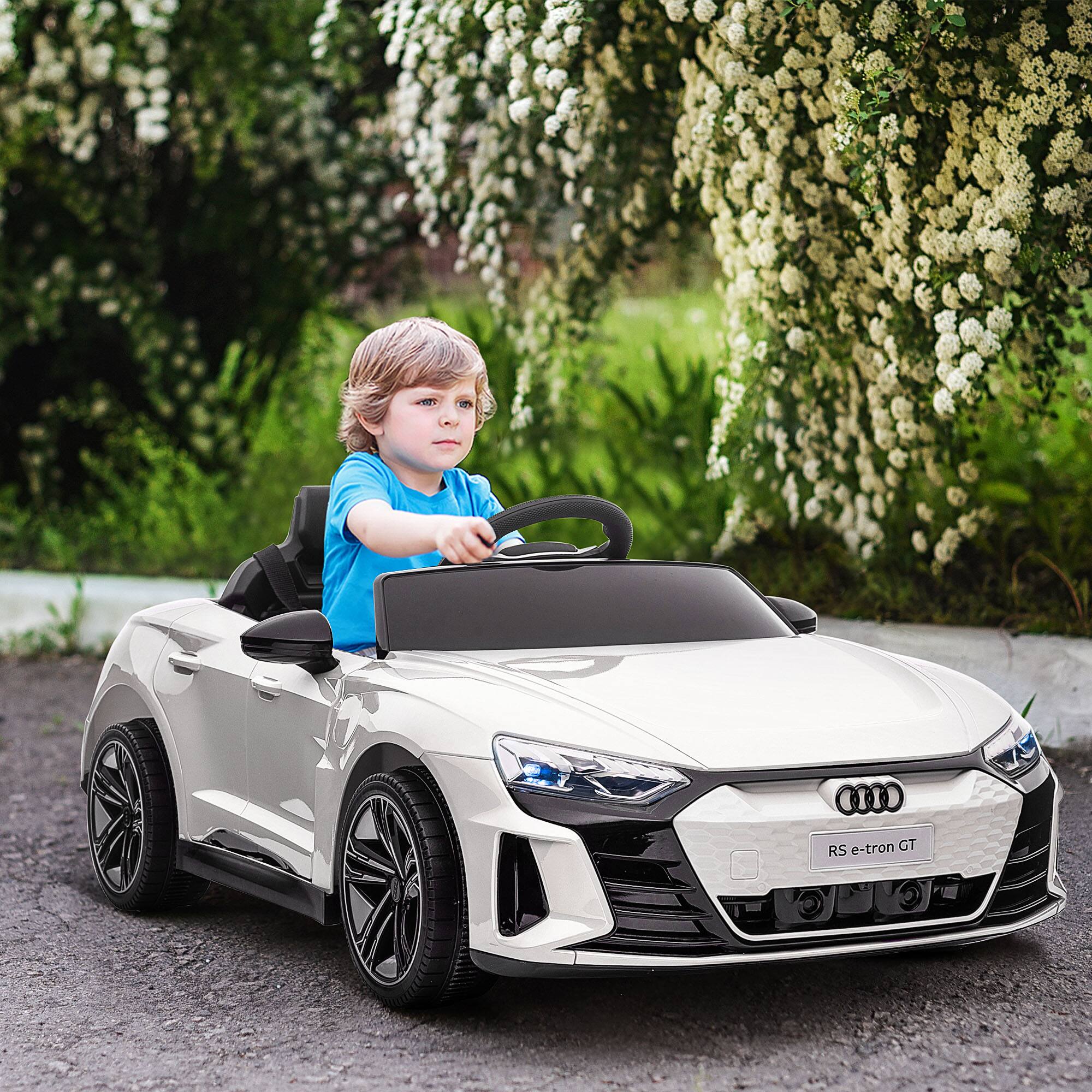 Angle. Aosom - Kids Ride on Car, 12V Licensed Audi RS E-tron GT 3.1 MPH Electric Car with Remote, 4 Wheels, Suspension, Horn, Music.