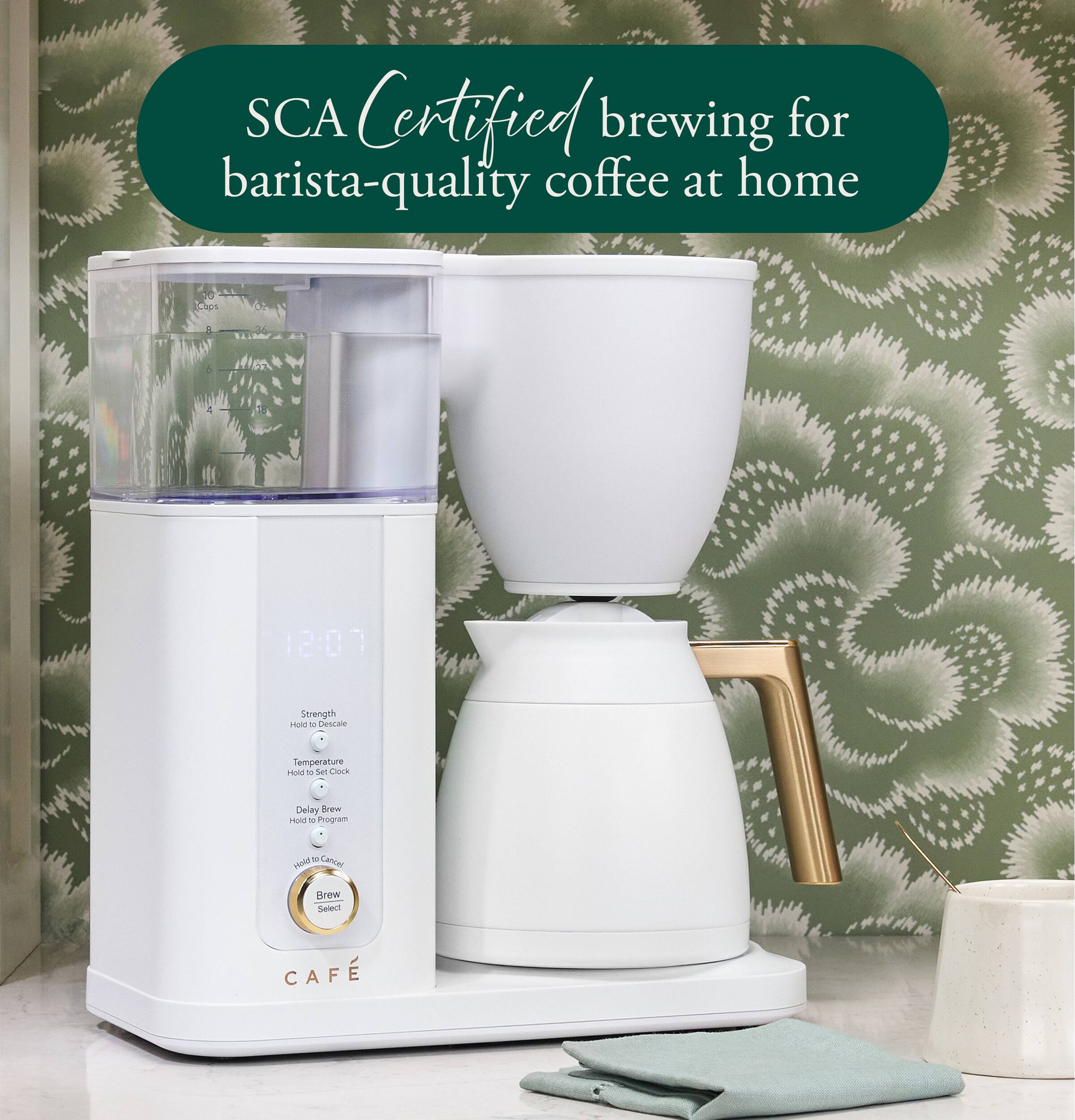 SCA Certified brewing for barista-quality coffee at home

Caps
4

Strength Hold to Descale
Temperature Hold to Set Clock
Delay Brew Hold to Program
Cancel Hold
Brew Select

CAFÉ