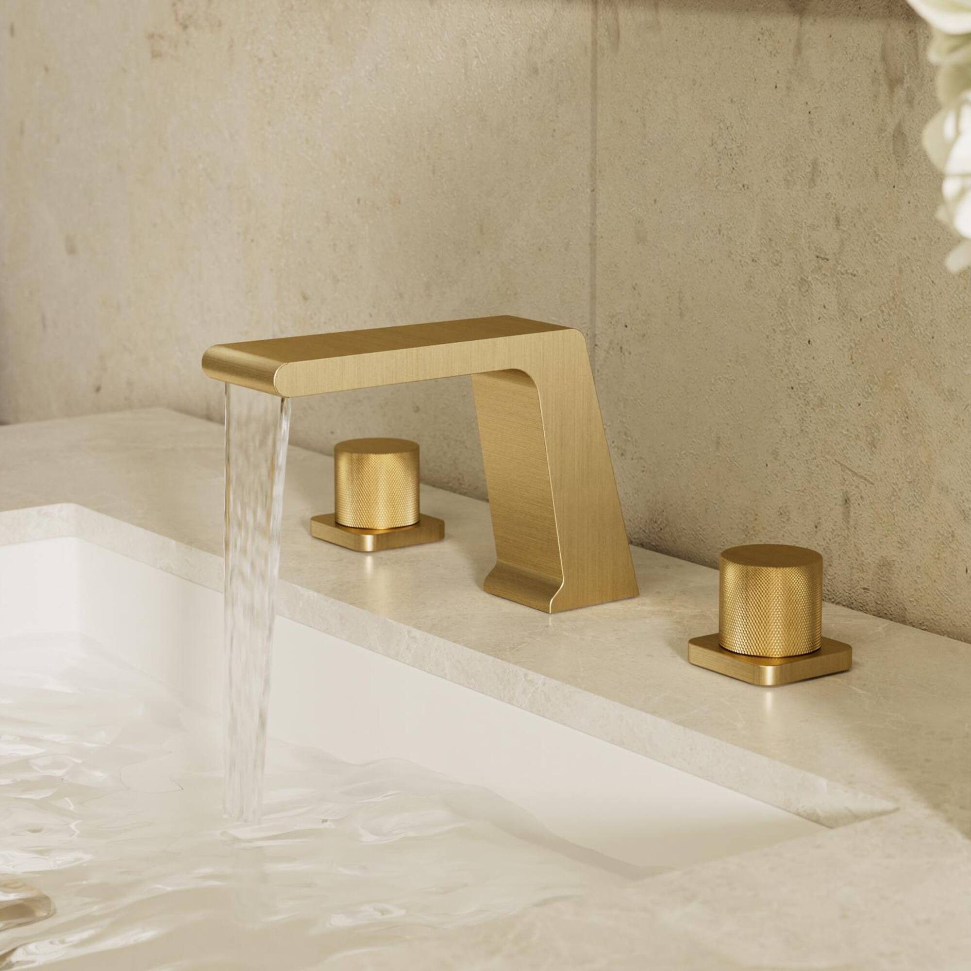 Left. GRANDJOY - 3‑Hole Waterfall Bathroom Sink Faucet with Dual Handles, and Wide Spout for Modern Vanity Spaces - Brushed Gold.