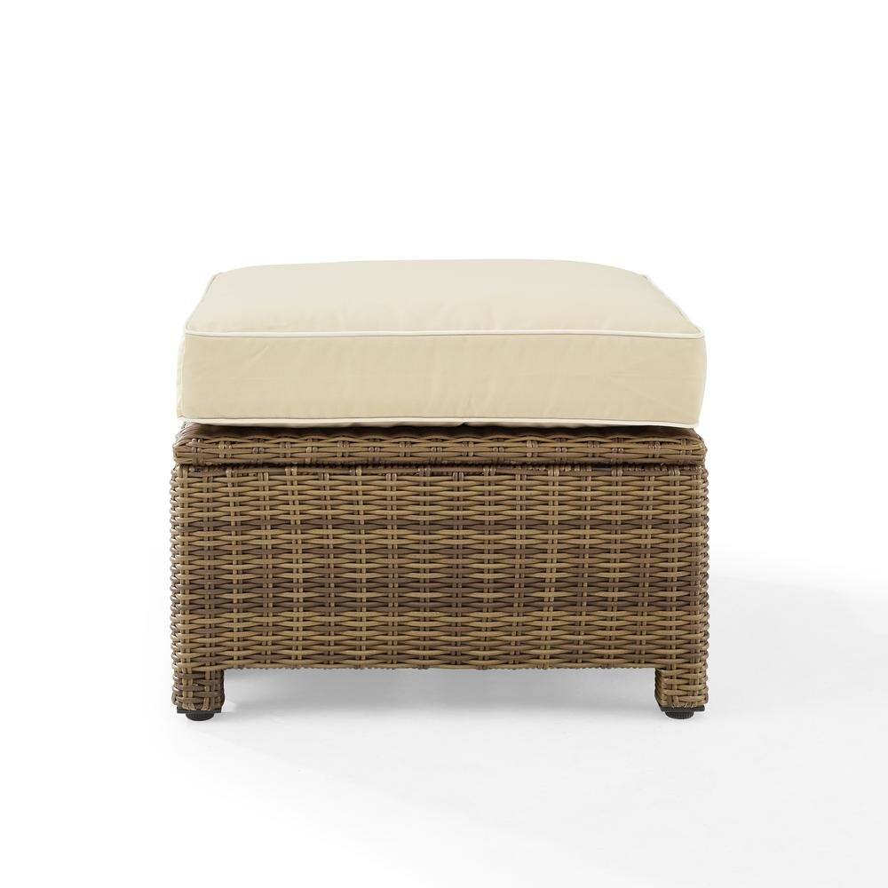 Back. Outdoor Escape - Brown Wicker Outdoor Ottoman with Sand Cushion – Foot Rest for Patio Lounging - Sand.