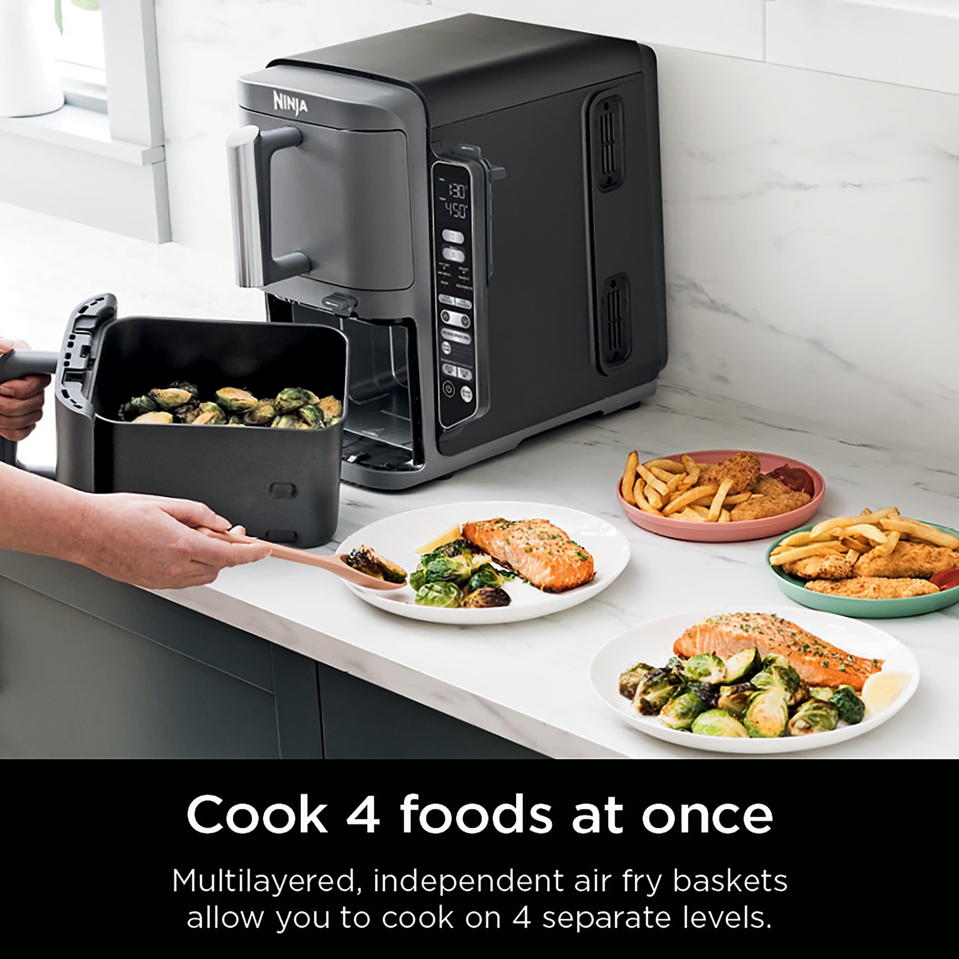 The Ninja 130 450 Cook 4 Foods at Once Multilayered, Independent Air Fry Baskets allow you to cook on 4 separate levels.