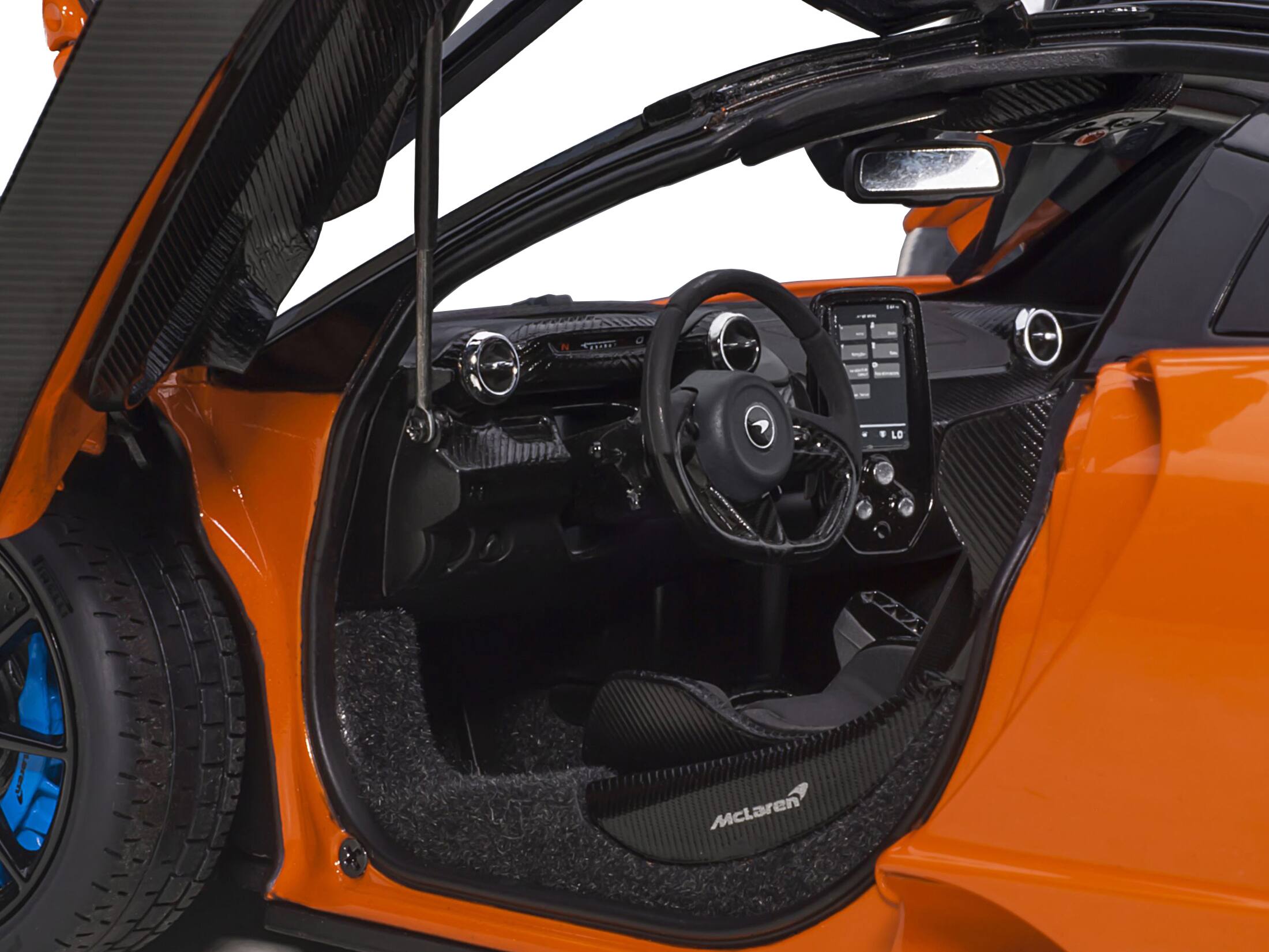 Left. Autoart - Mclaren Senna Trophy Mira Orange and Black with Carbon Accents 1/18 Model Car by Autoart - Mira Orange And Black With Carbon.