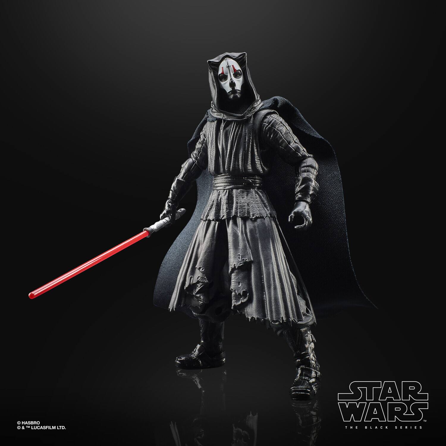 The text on the image is:

"© HASBRO & T LUCASFILM LTD STAR WARS - THE BLACK SERIES"

Corrected and grouped:

"© HASBRO & T LUCASFILM LTD STAR WARS - THE BLACK SERIES"