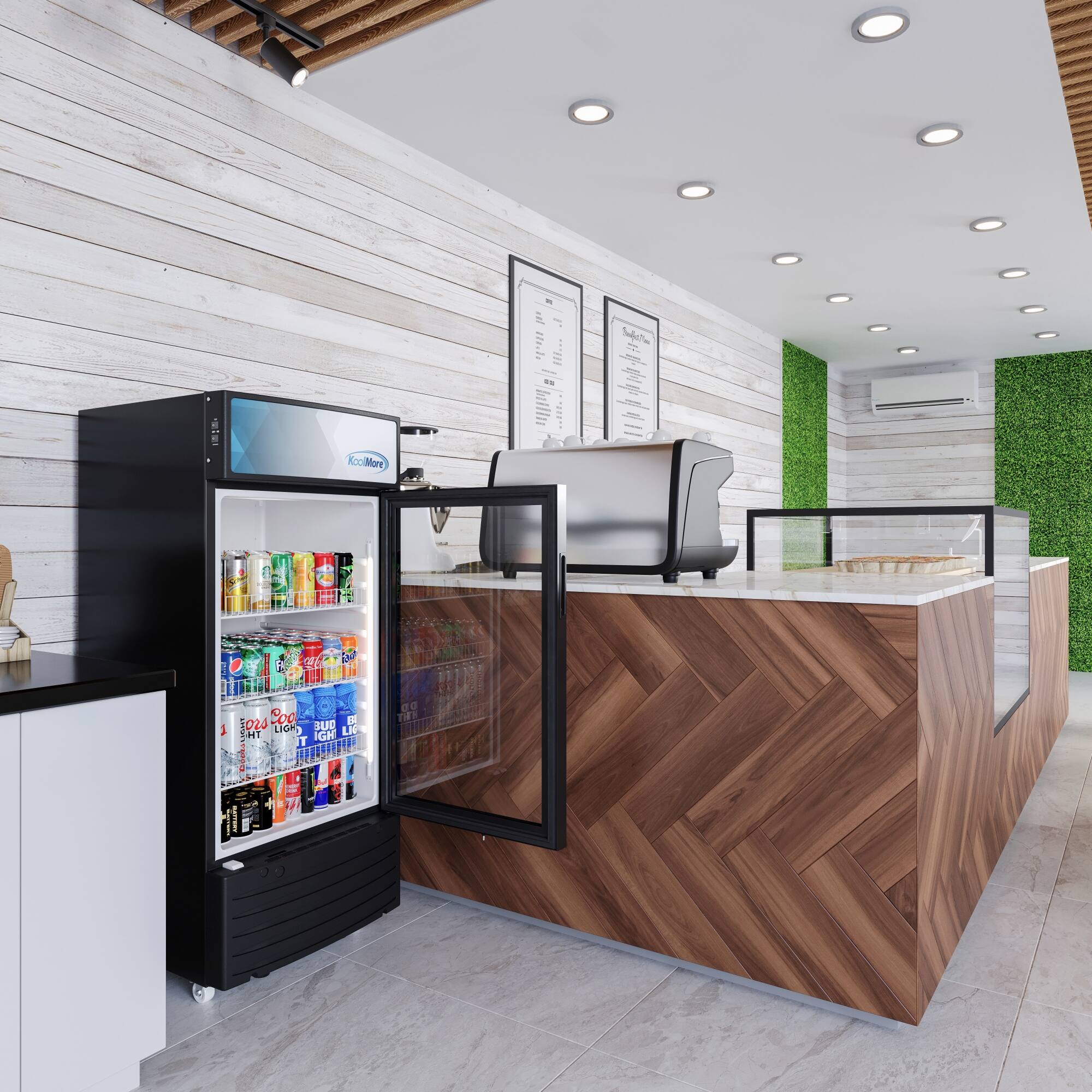 The image features a kitchen area with a refrigerator, a coffee maker, and a counter. The refrigerator is stocked with various drinks, including cans of soda. The kitchen also has a sink and a dining table. The overall setting appears to be a restaurant or a similar establishment.